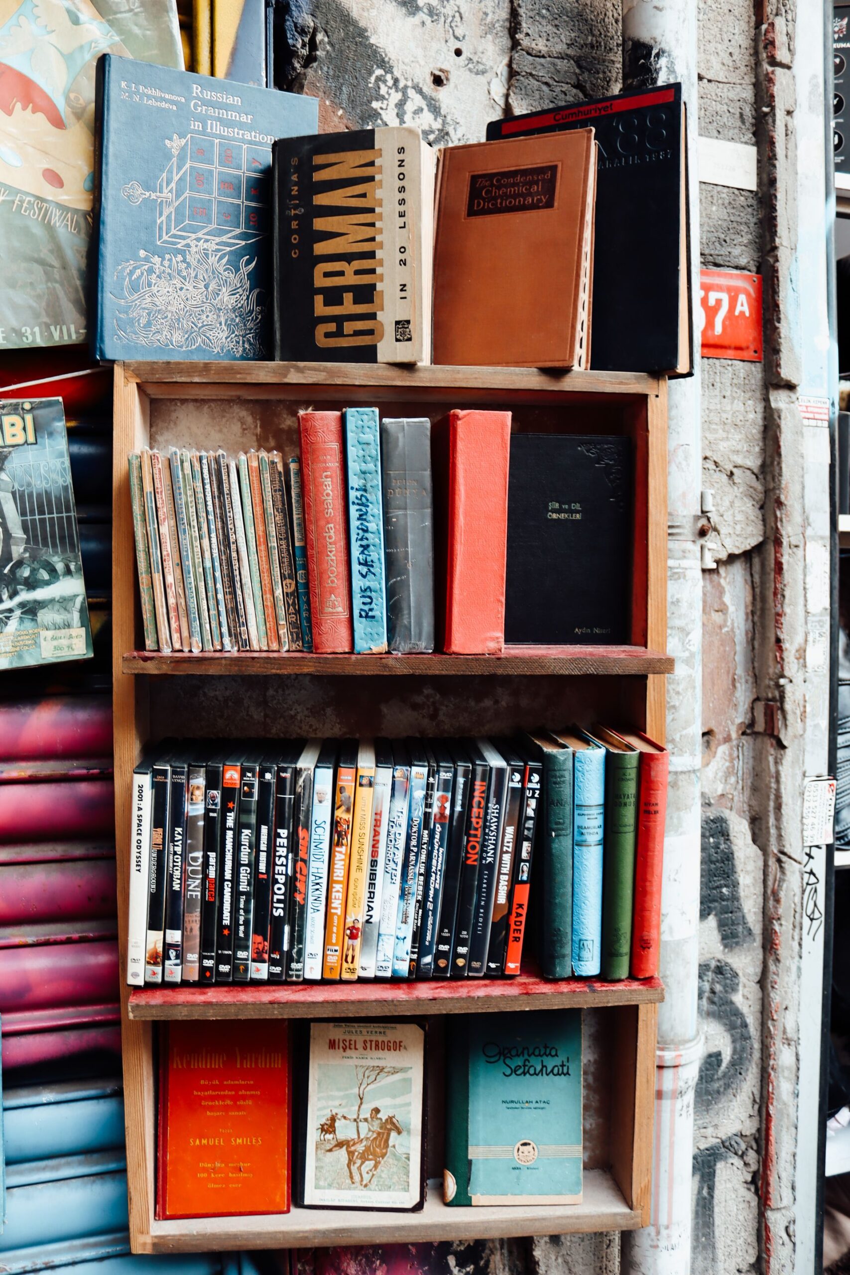 Vibrant wooden bookshelf filled with assorted books