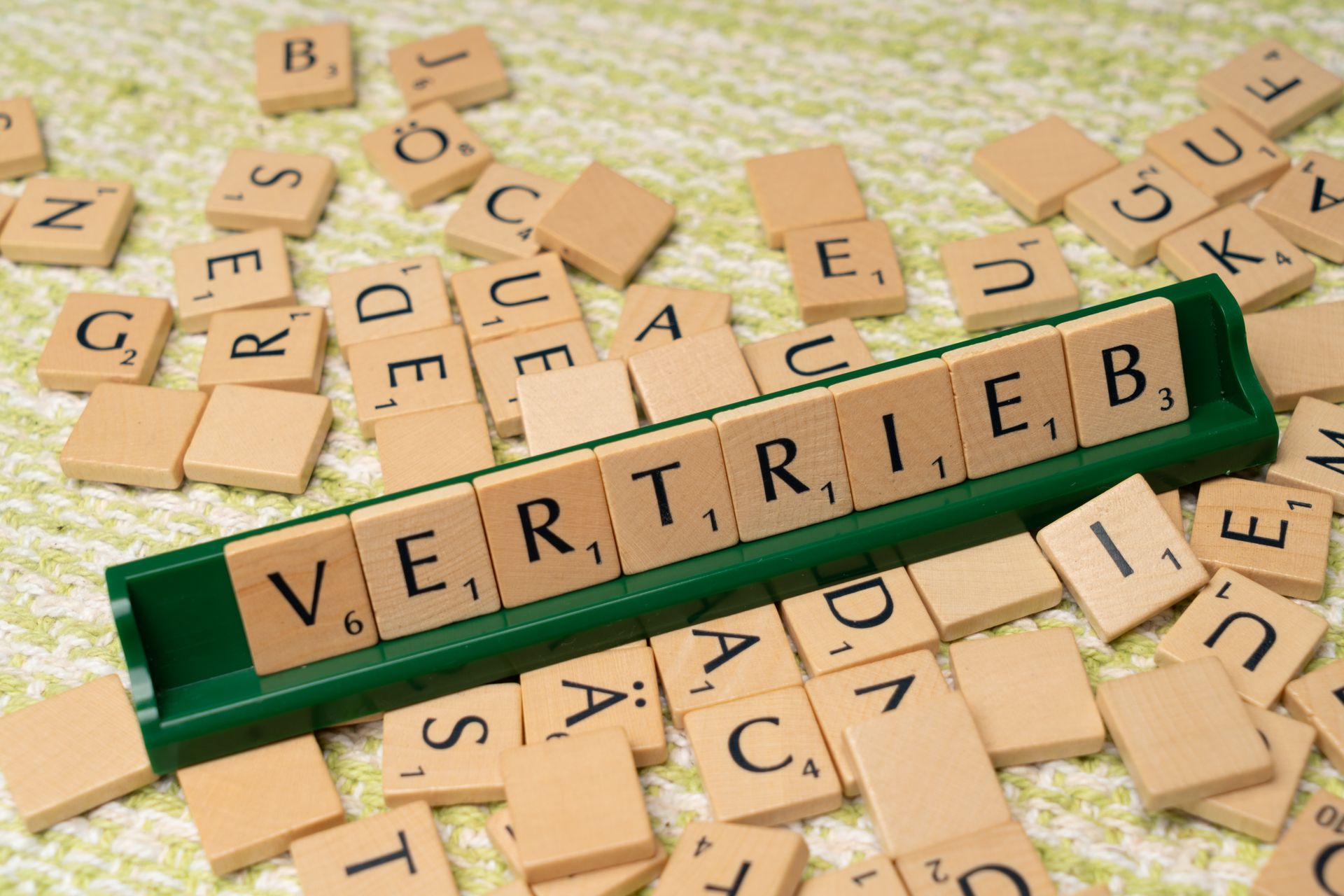 Stacked wooden blocks with letters spelling words