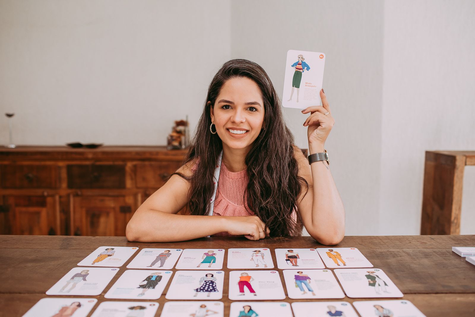 Woman holding educational flashcards