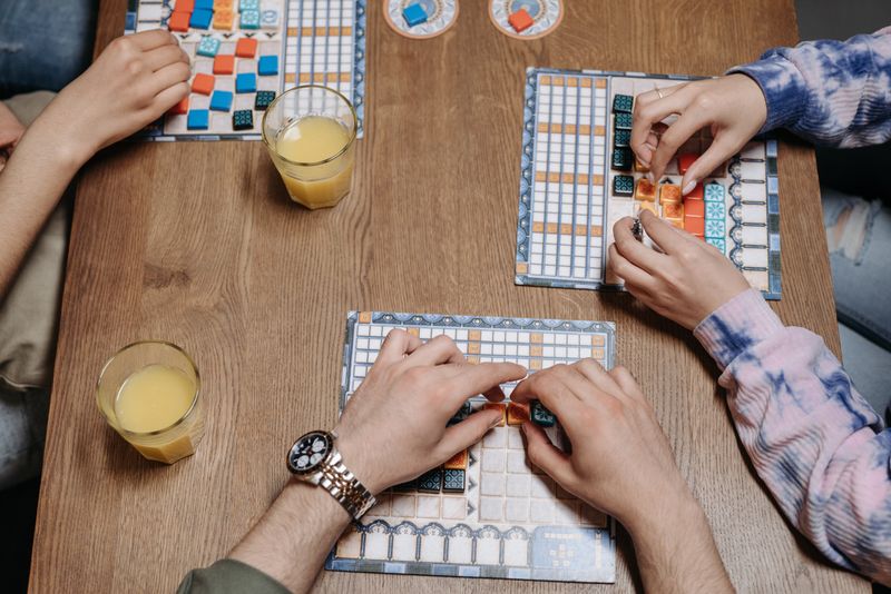 Friends enjoying a board game night