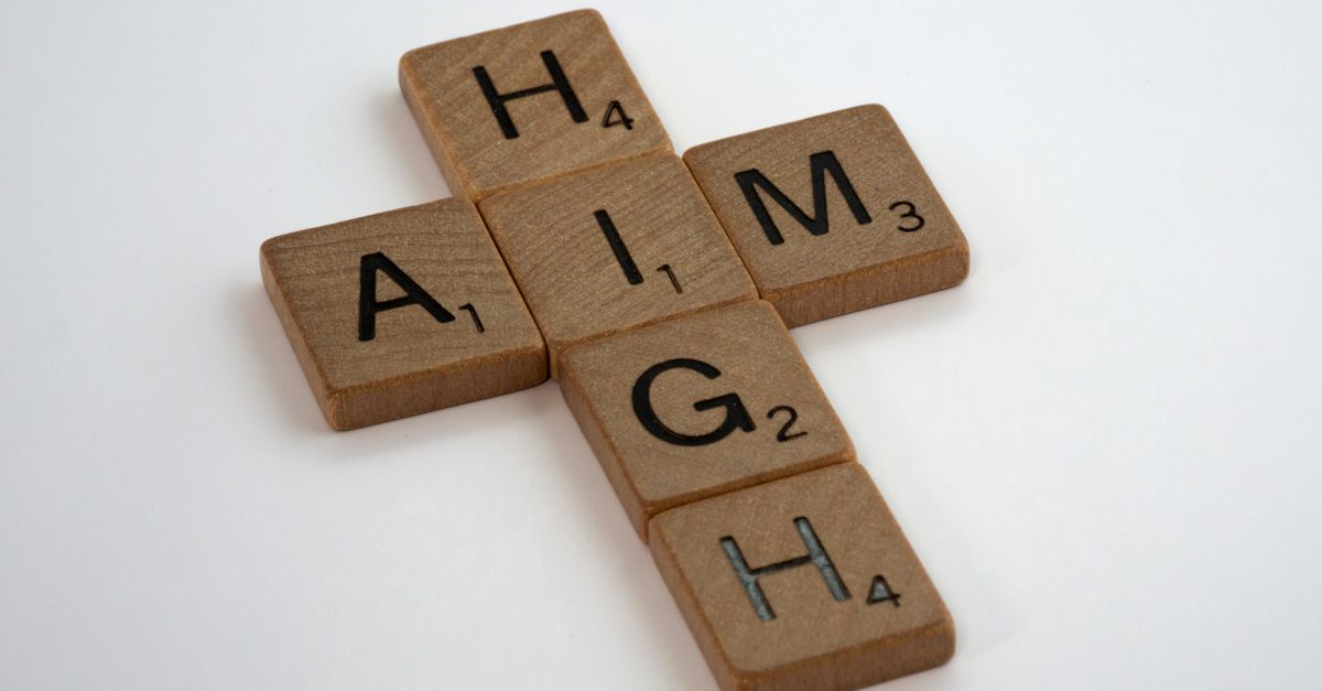 Wooden Scrabble tiles on a white background