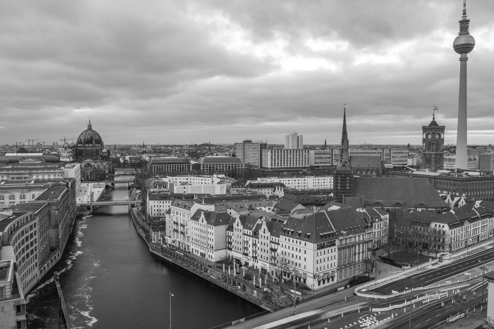 Dramatic black and white aerial view of Berlin with the Fernsehturm and Spree River