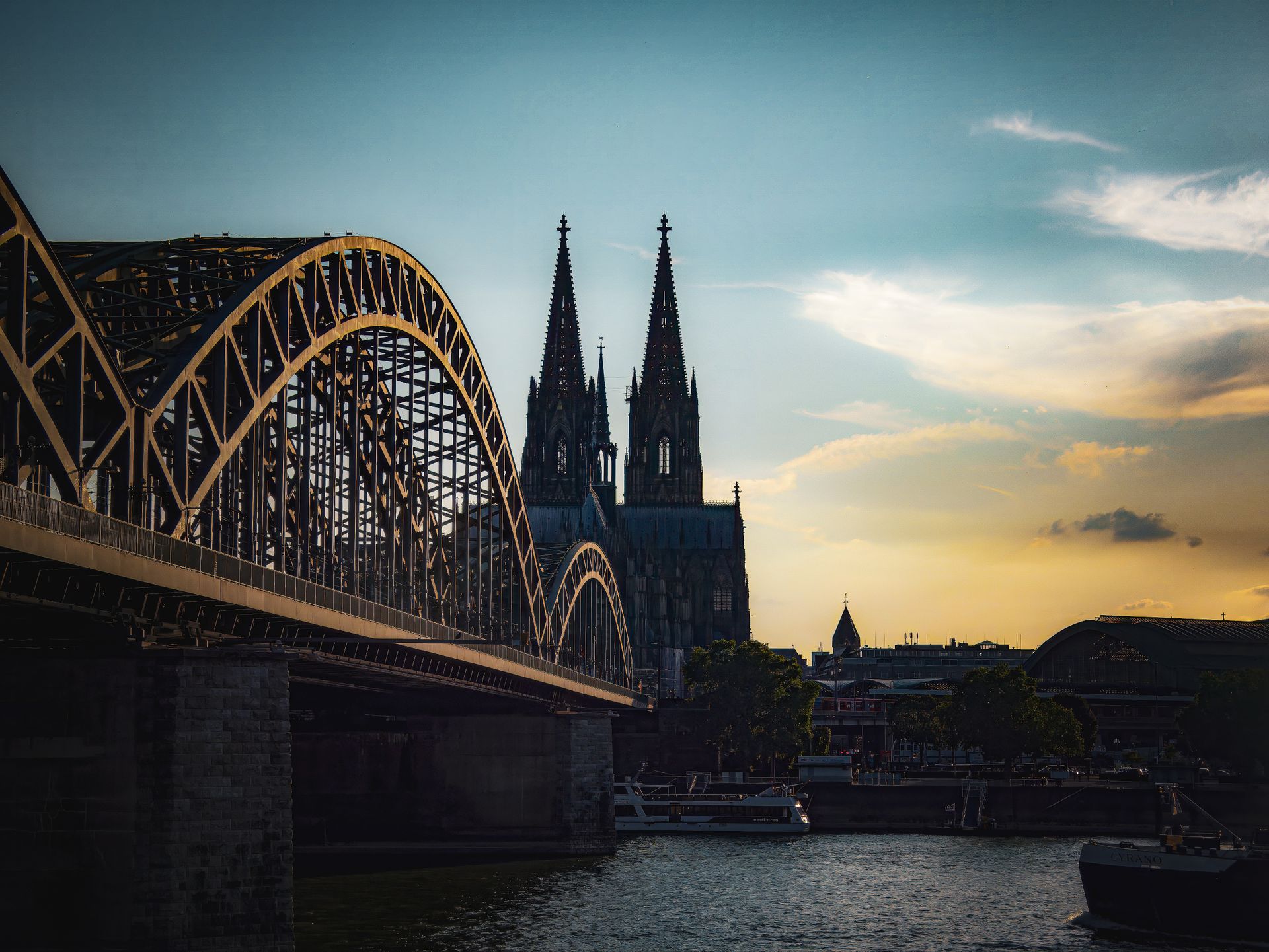 Cologne Cathedral and bridge over the Rhine at sunset