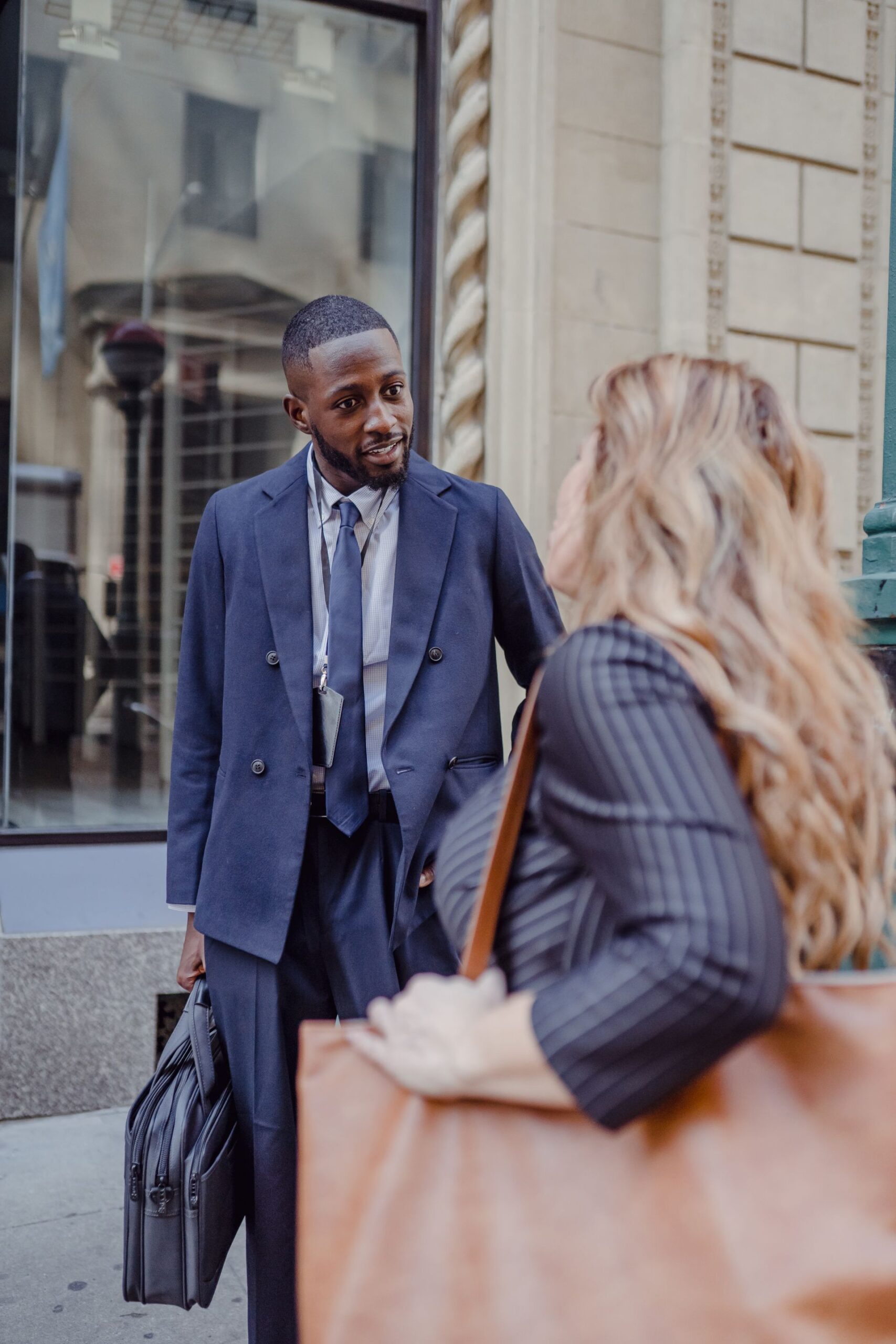 Man talking with a woman on the street