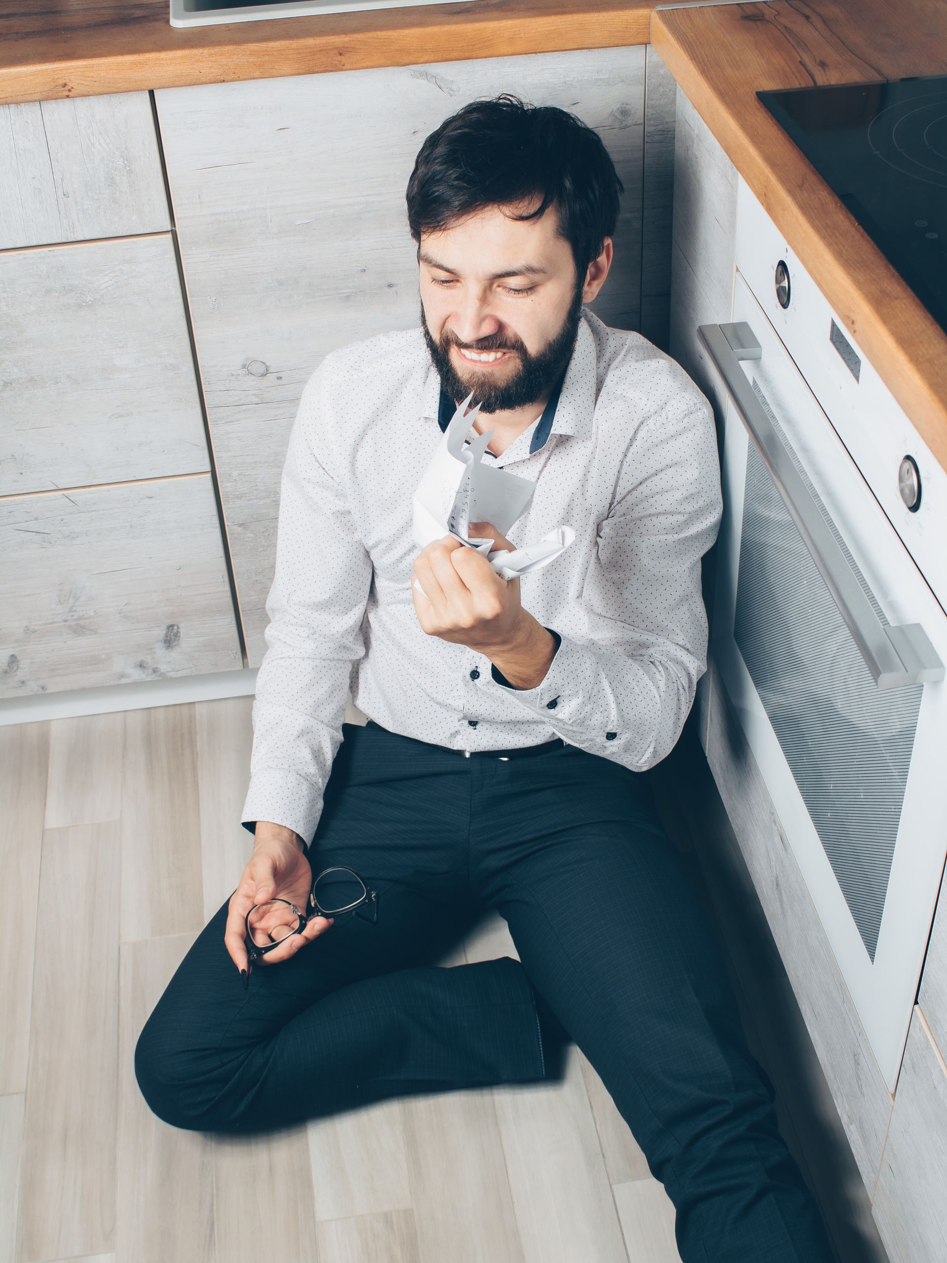 Frustrated man crumpling a paper