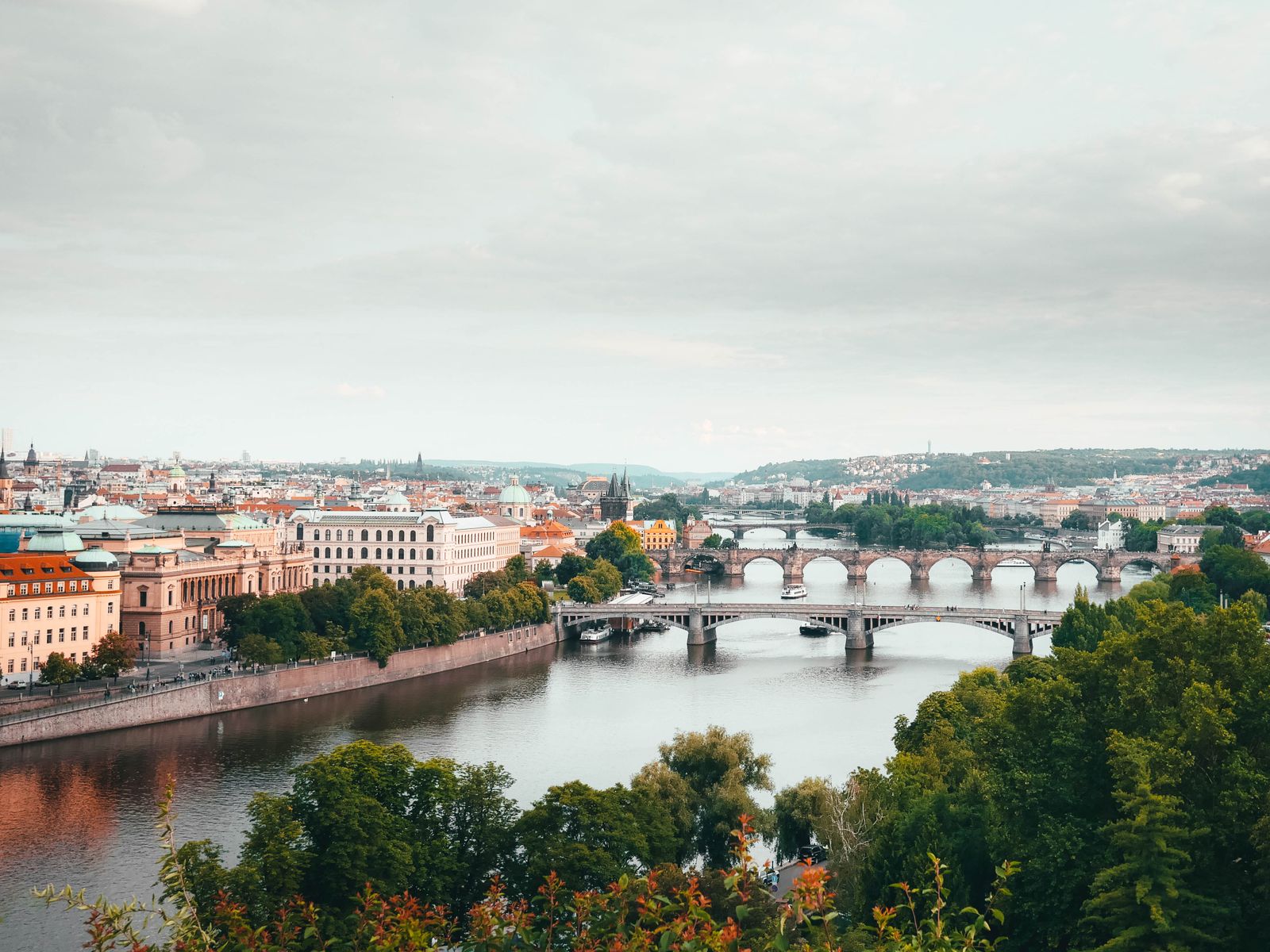 Bridges above a river in a cityscape