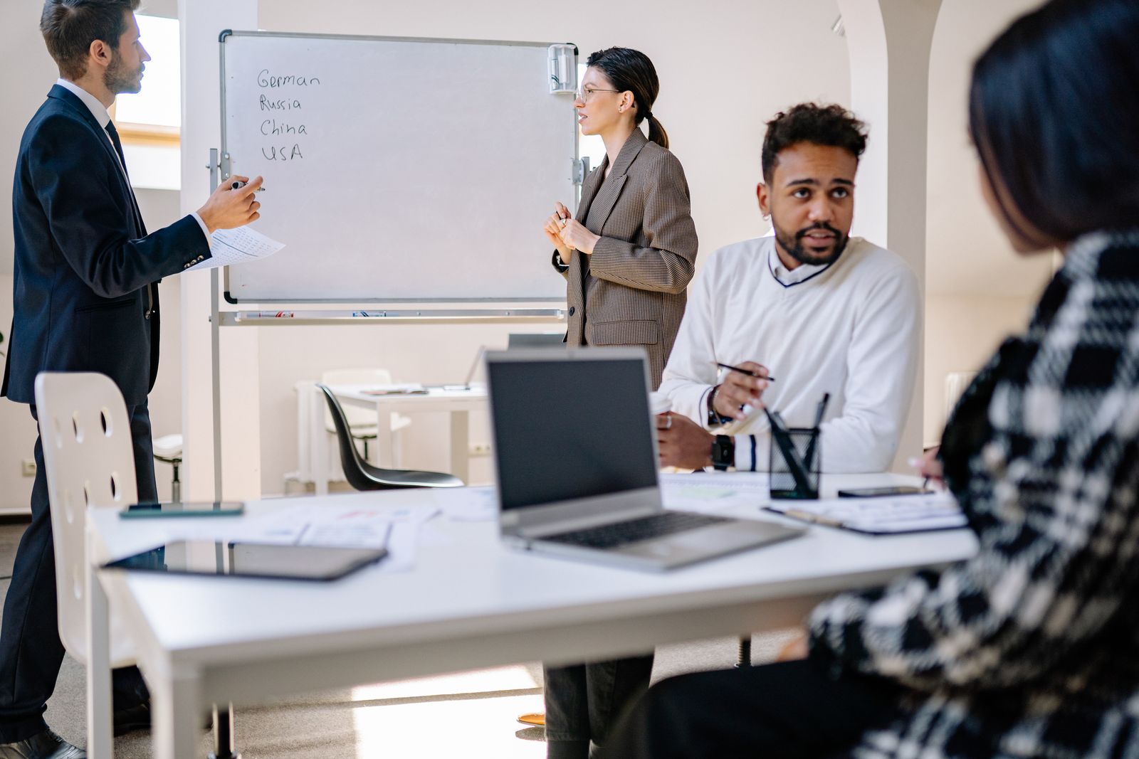 Group of people having a discussion at work