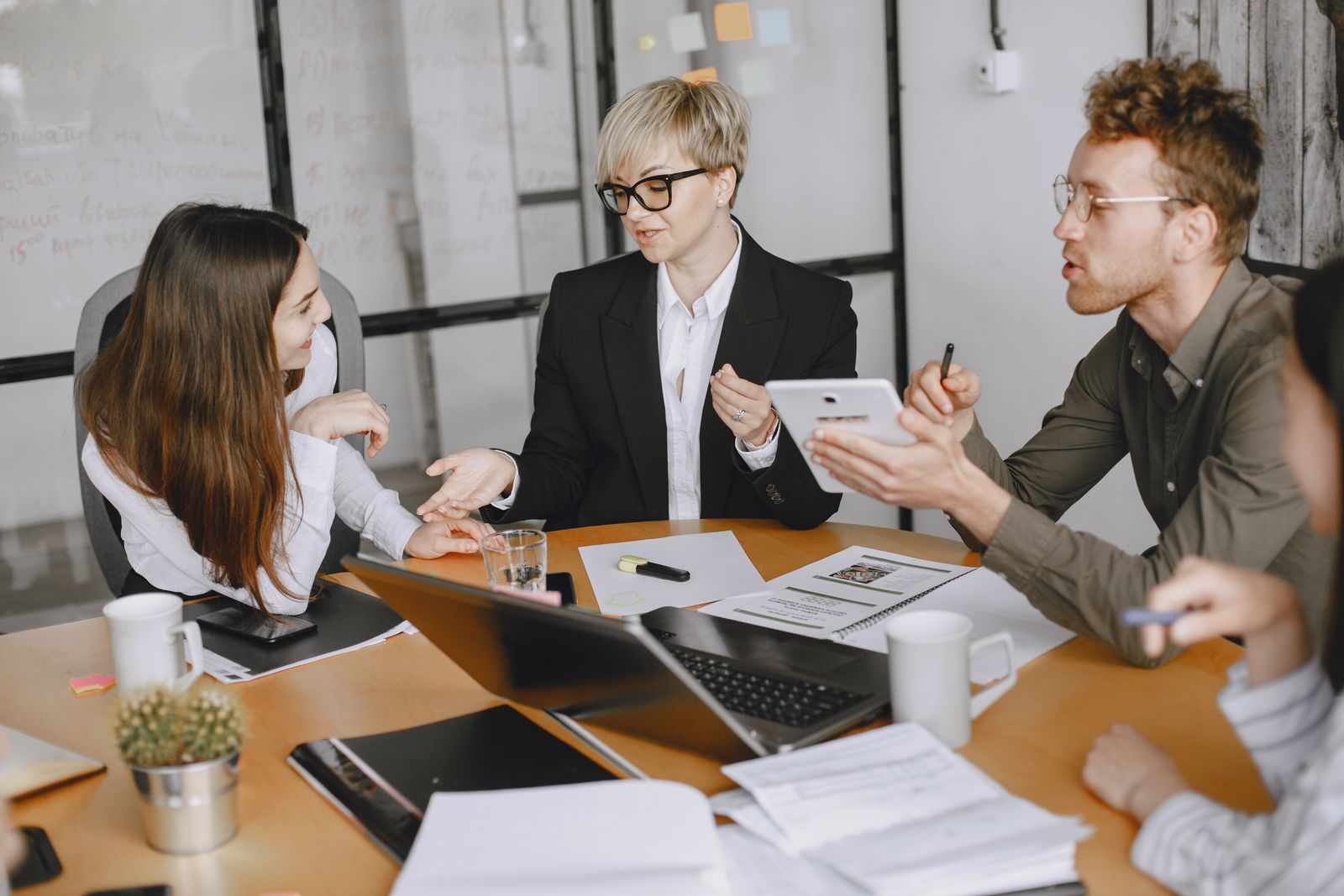 Businesspeople brainstorming in a conference room