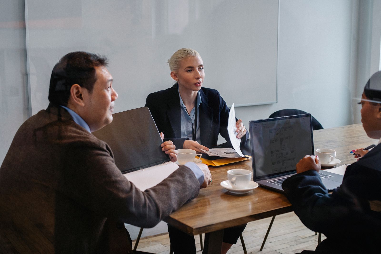 Group of coworkers discussing business strategy