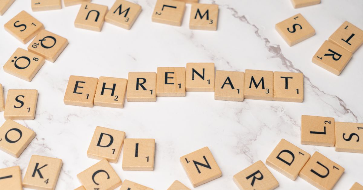Scrabble tiles spelling the German word Ehrenamt