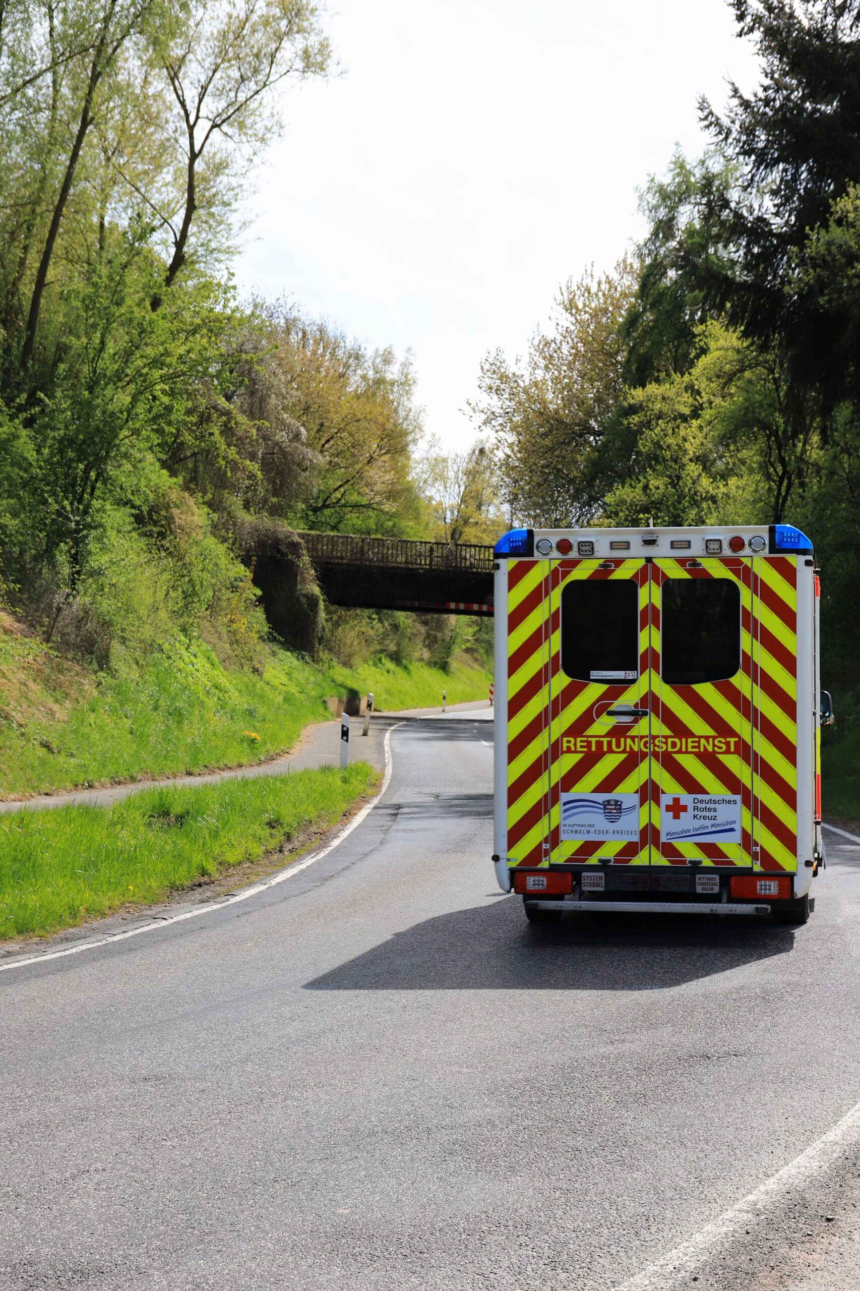 Emergency ambulance on a rural road