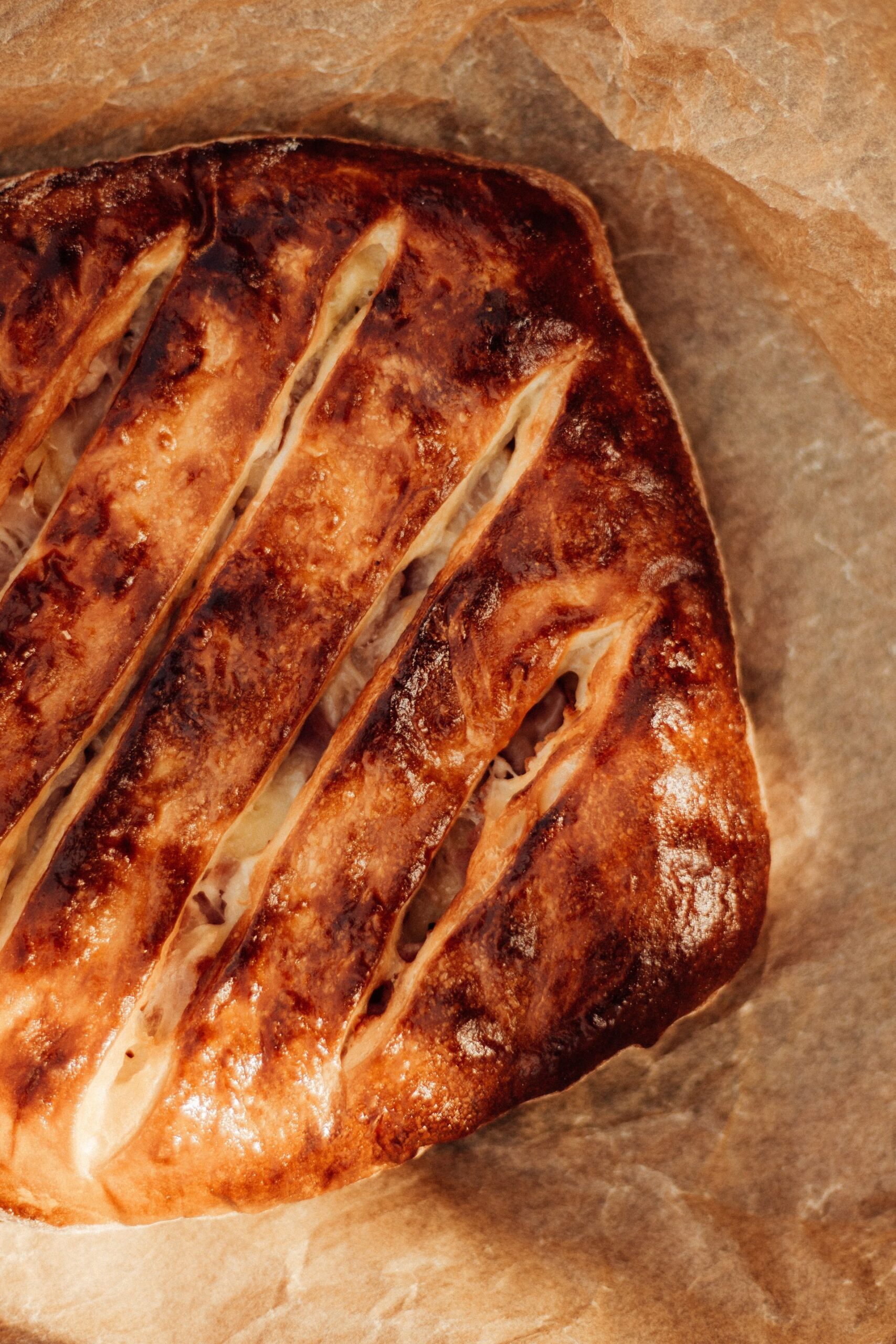 Freshly baked artisan white bread with golden crust
