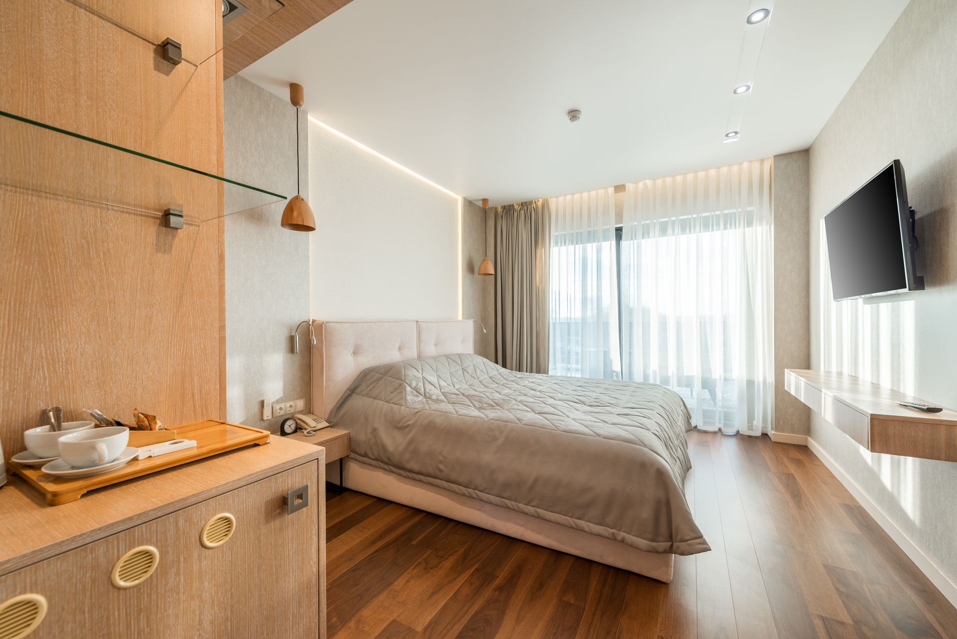 Modern elegant hotel room interior with natural light
