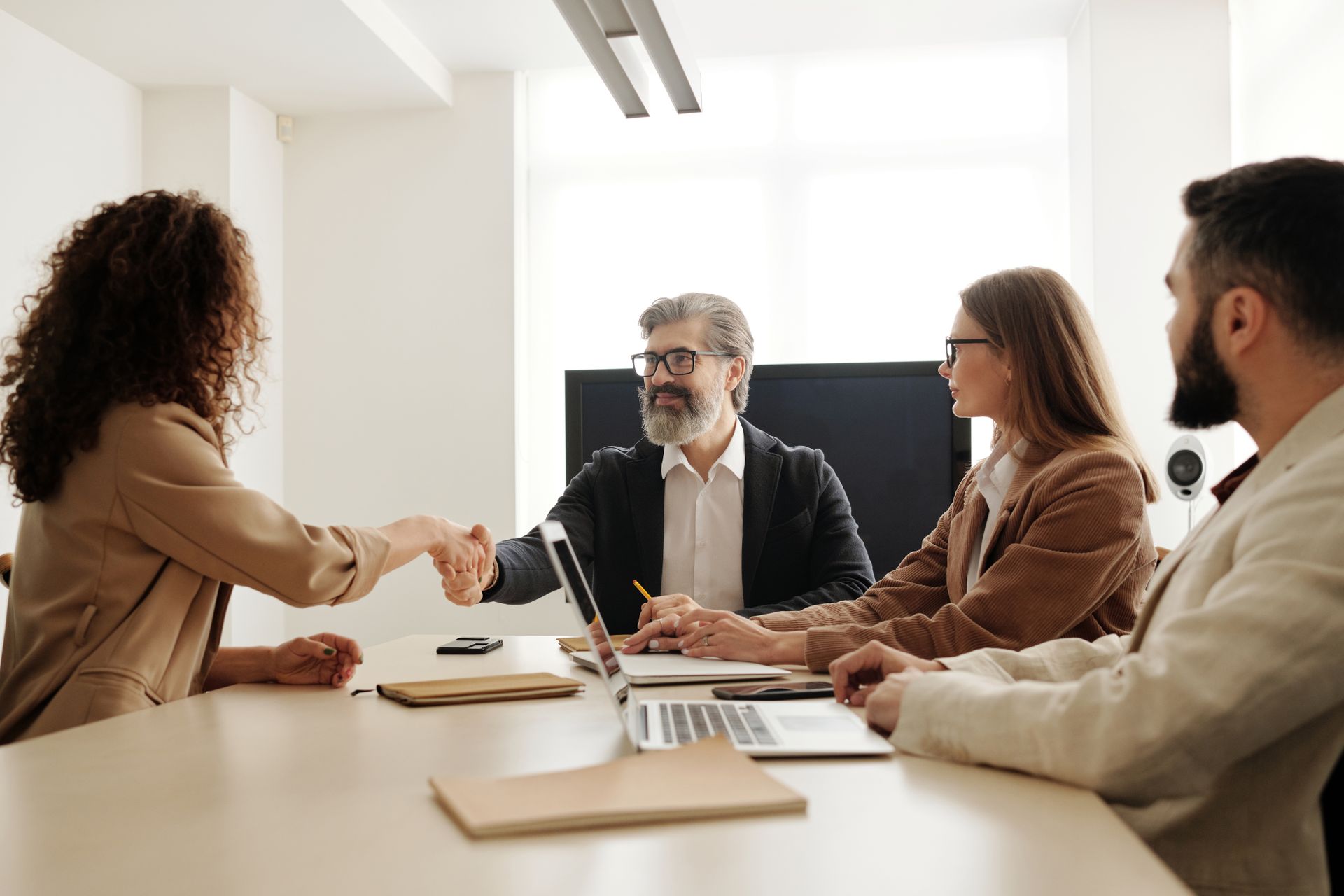 Professional handshake in an office