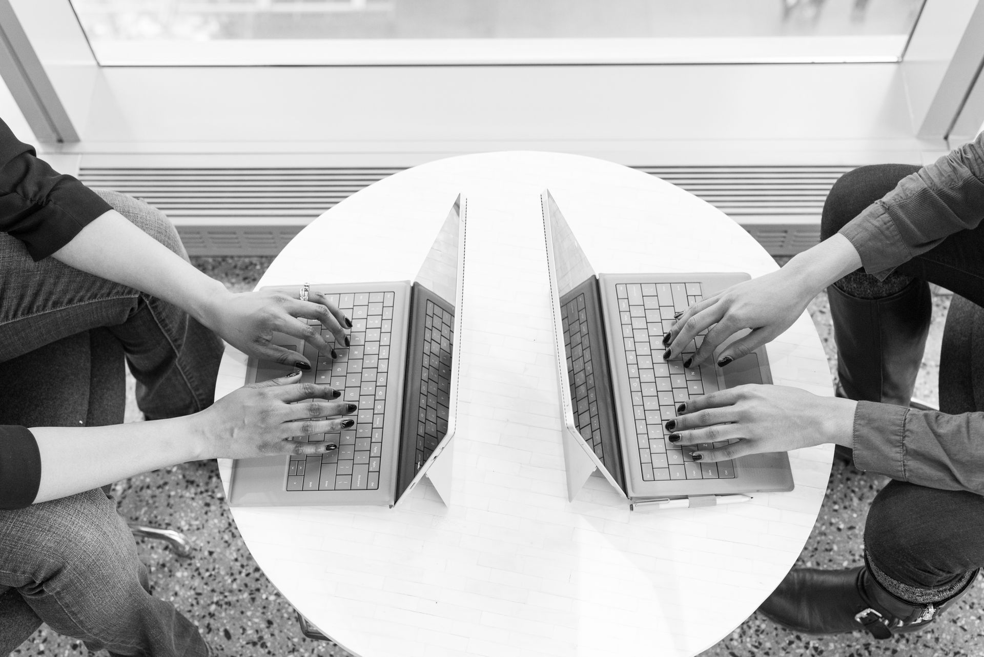 Office workers collaborating at desks