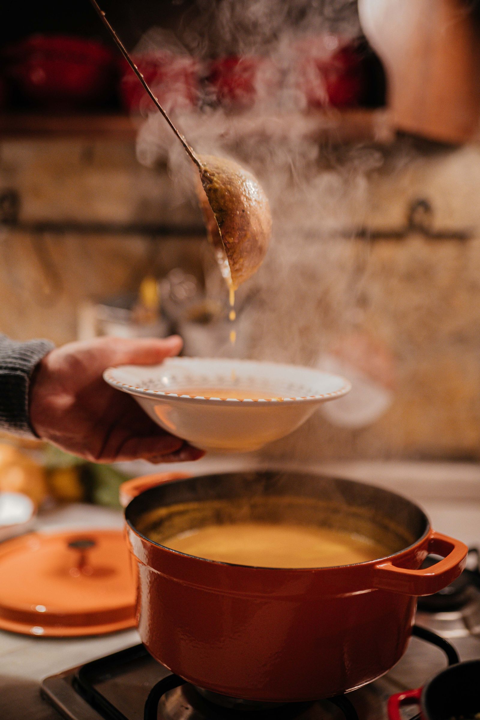 Pot of soup simmering on the stove