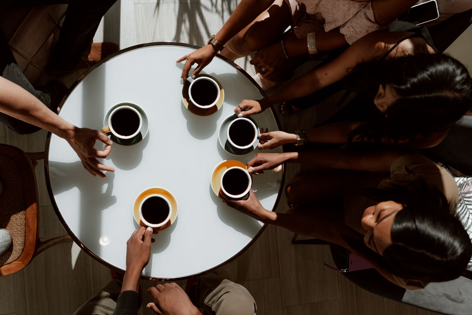 Friends chatting over coffee