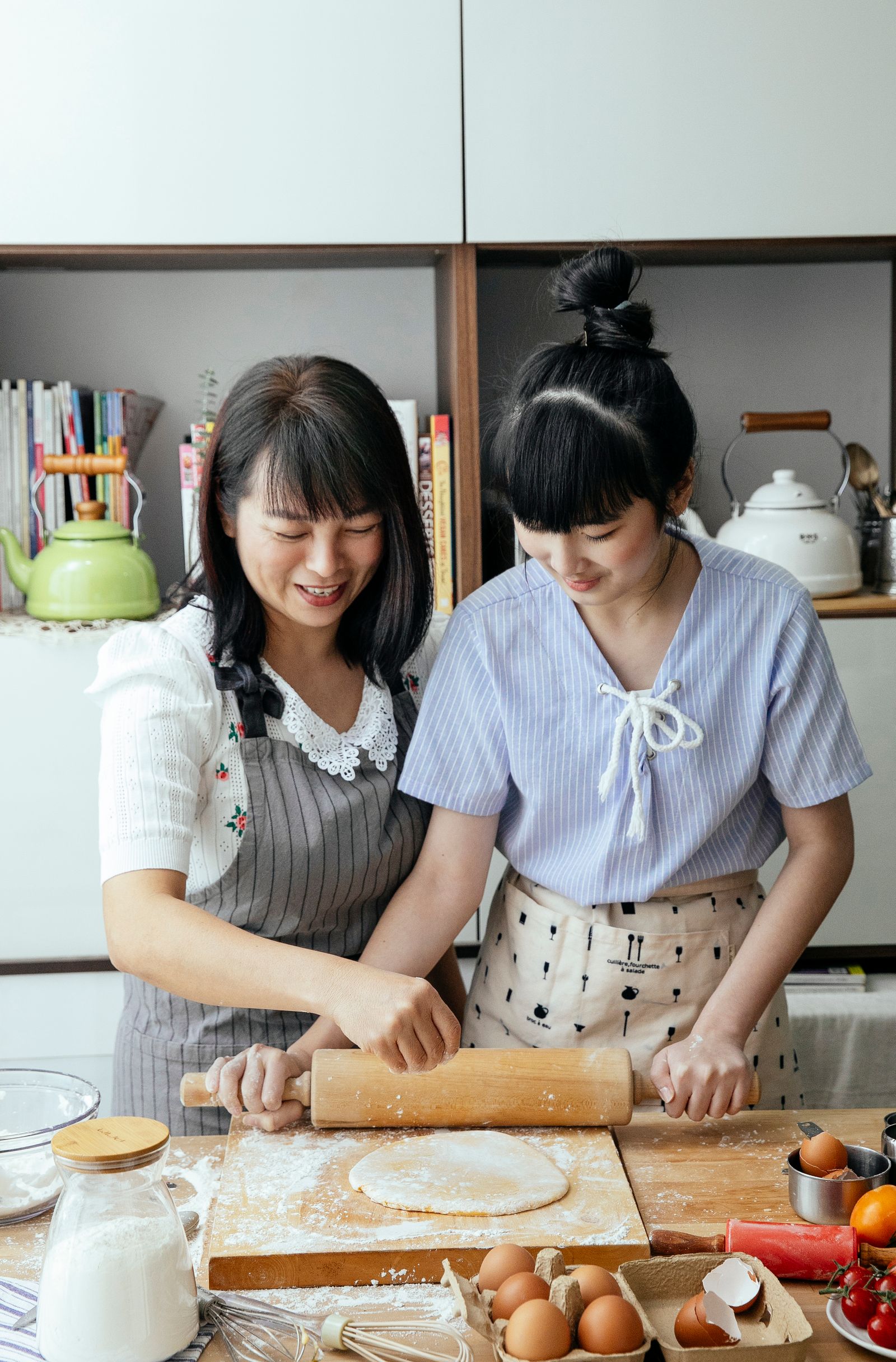 Friends cooking together in a kitchen