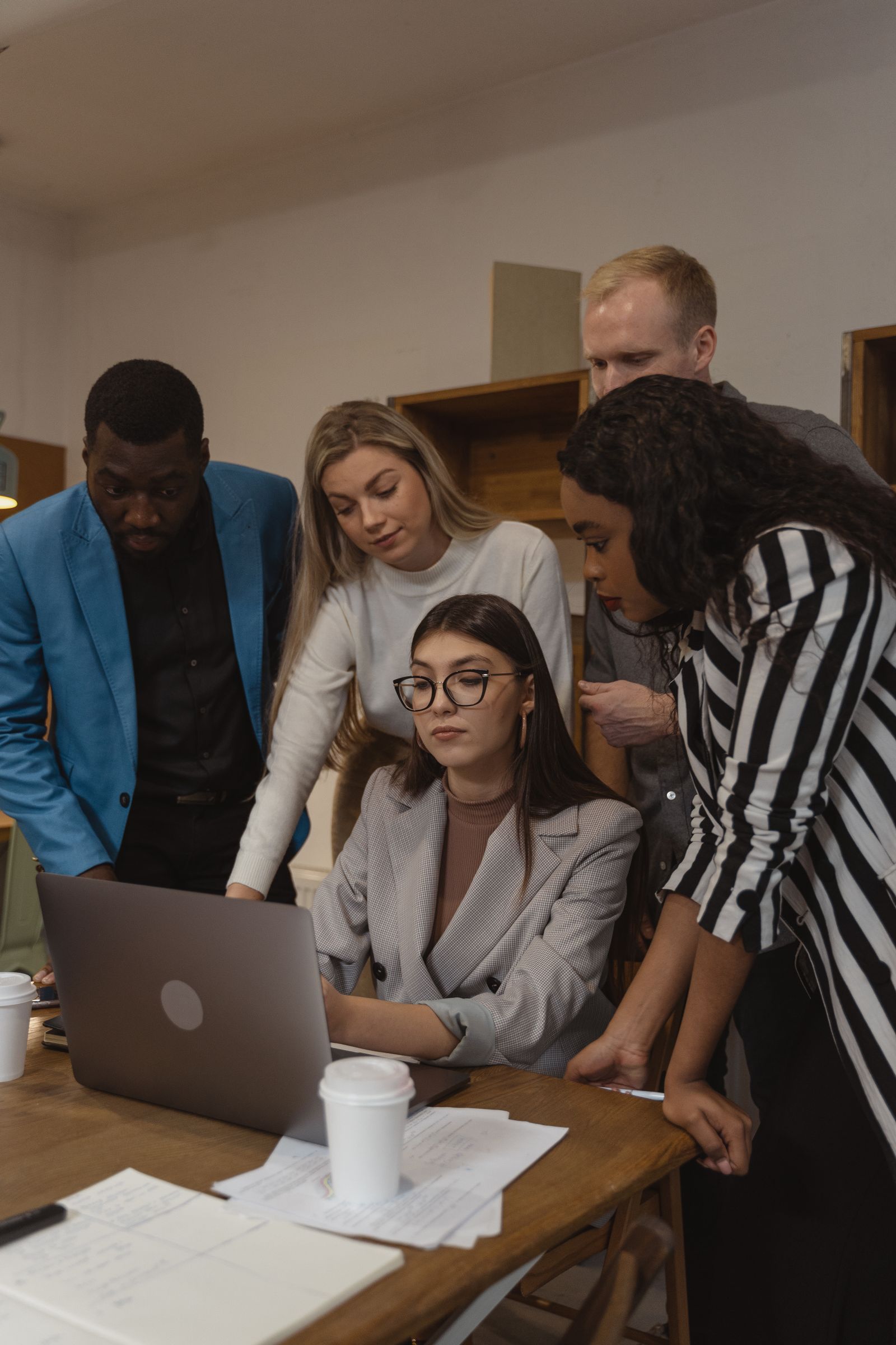 Diverse professionals collaborating in a modern office