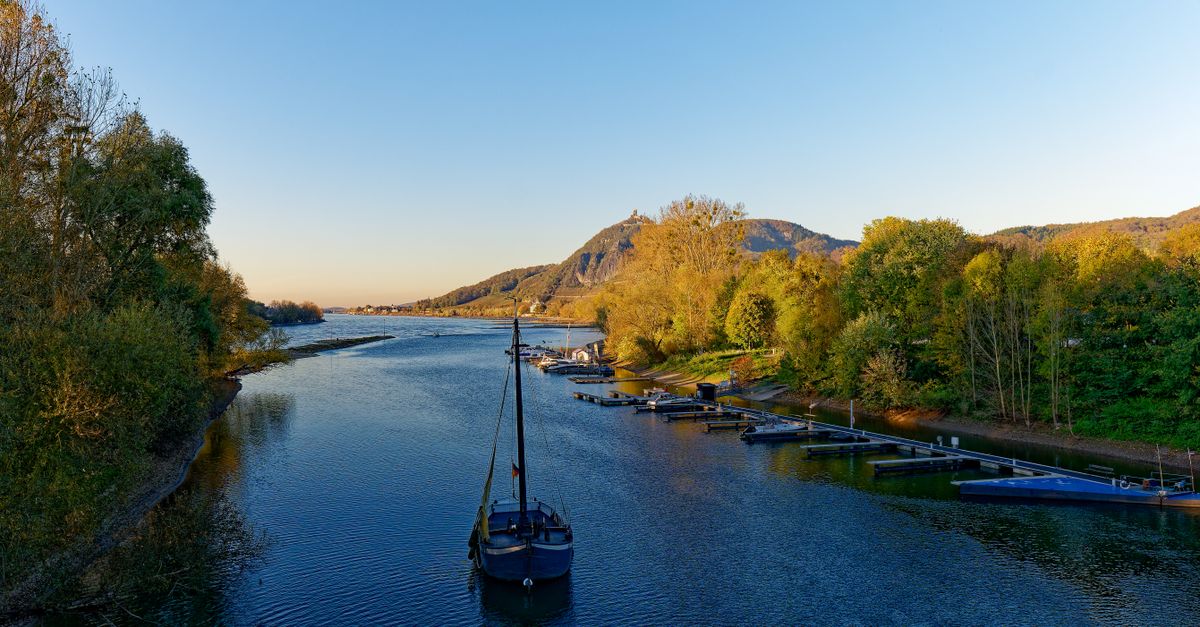 Boat on the calm Rhine River at sunset in Bad Honnef
