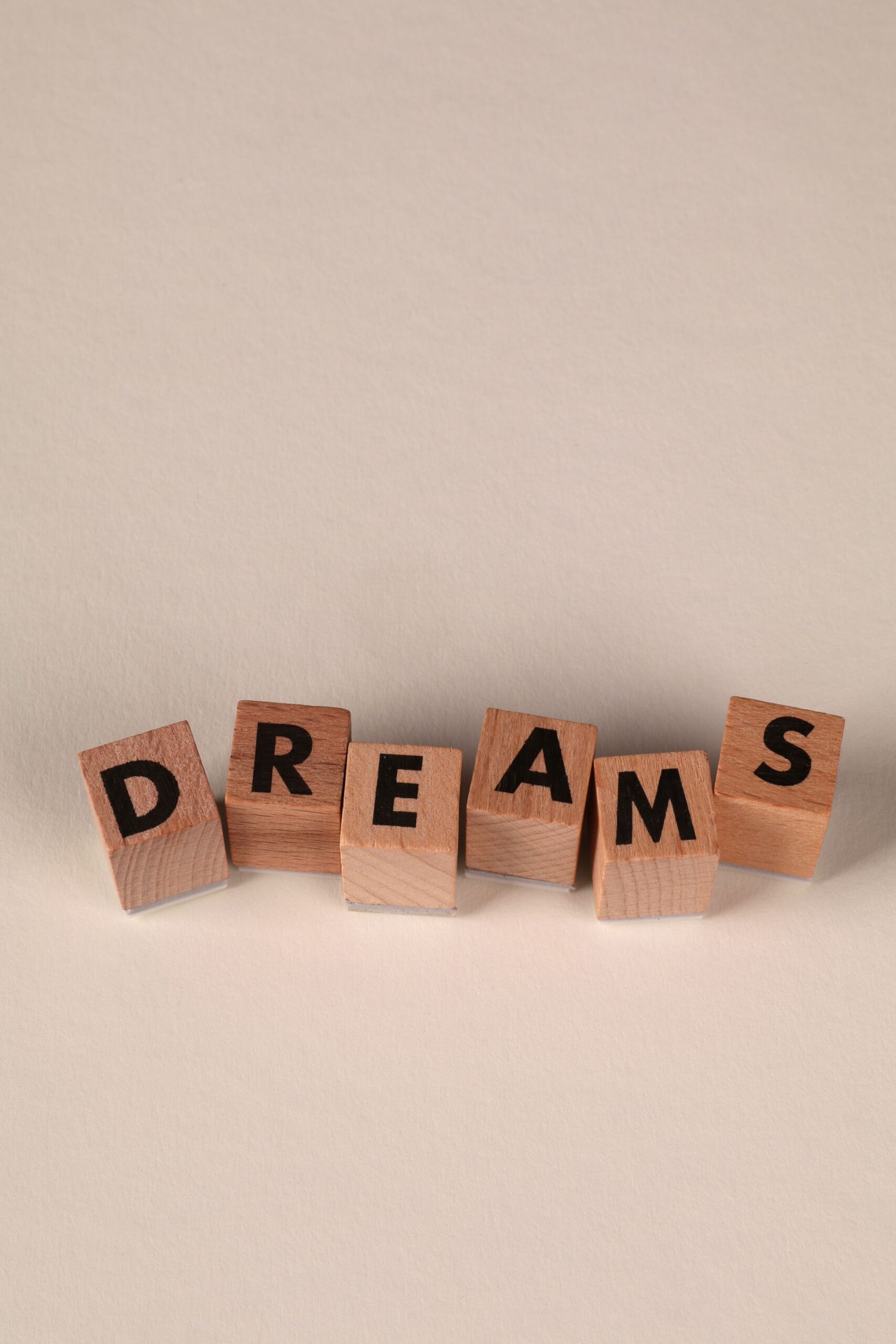 Wooden letter blocks forming the word Dreams