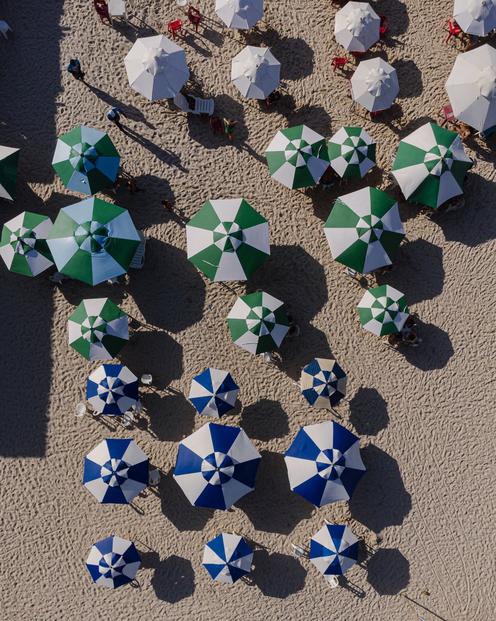Sandy beach with colorful umbrellas