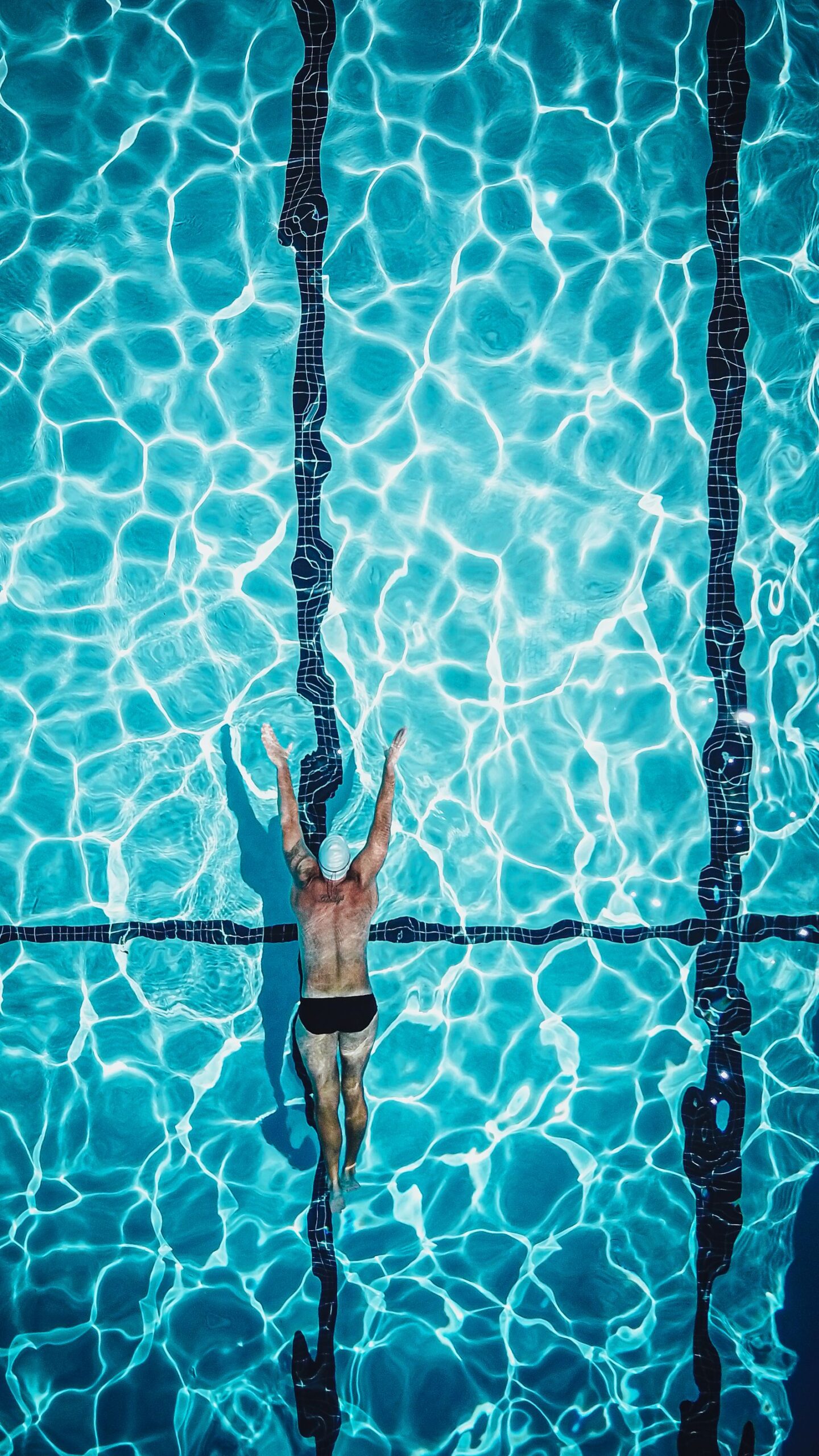 Sparkling blue swimming pool water