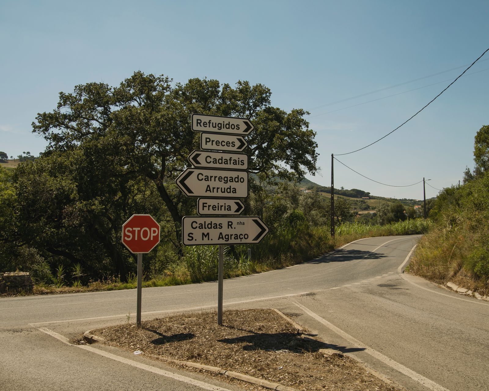 Road signs with directions on a street in Portugal