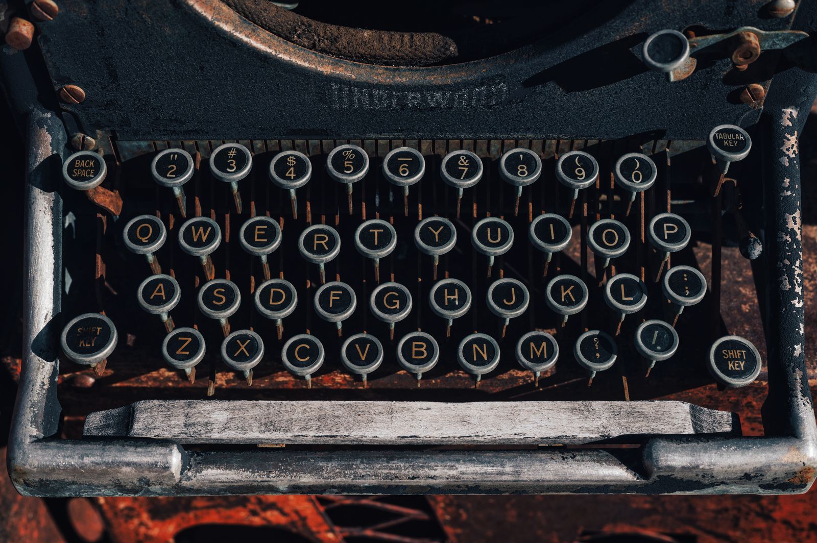 Vintage typewriter keys with letters