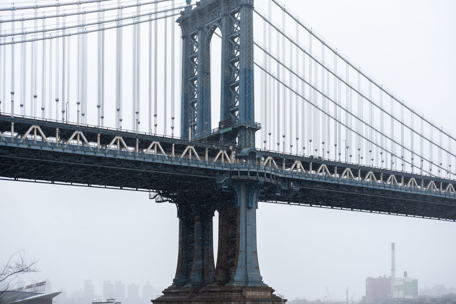 Manhattan Bridge captured during a snowstorm