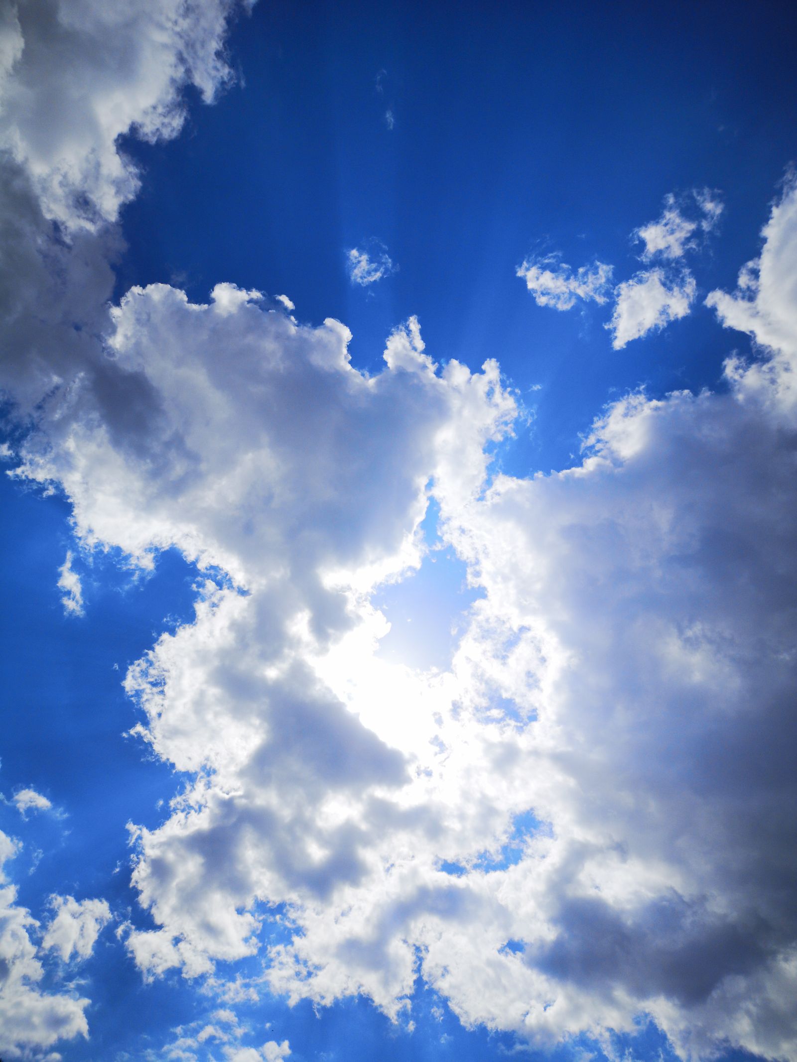 Bright sunshine breaking through clouds