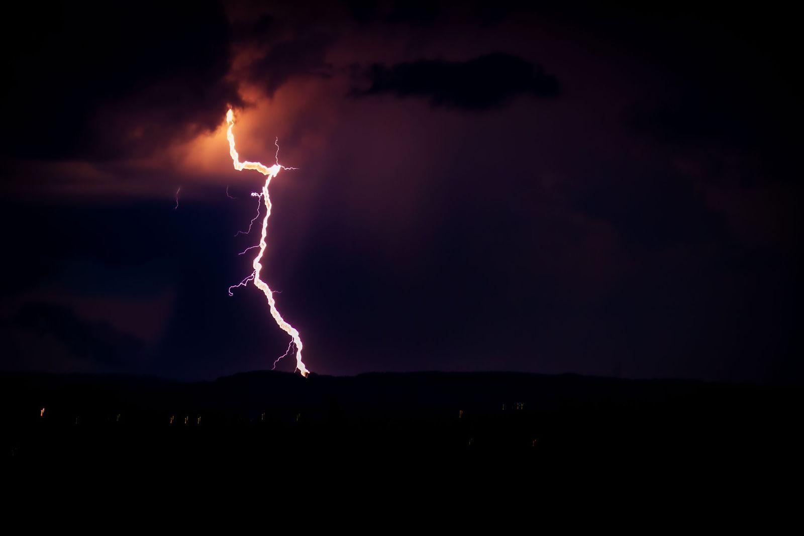 Lightning striking during a thunderstorm