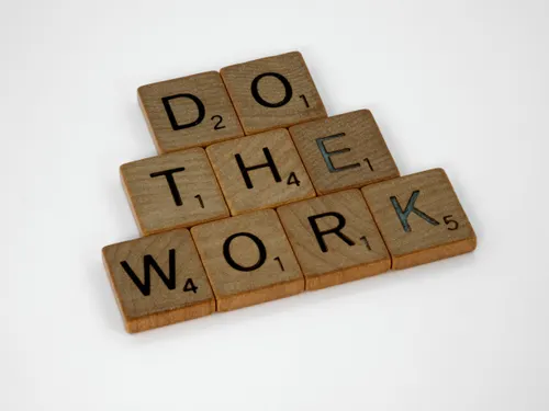 Wordle and word game letter tiles arranged on a table