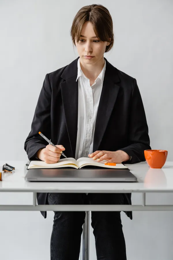 Taking notes with pen and paper