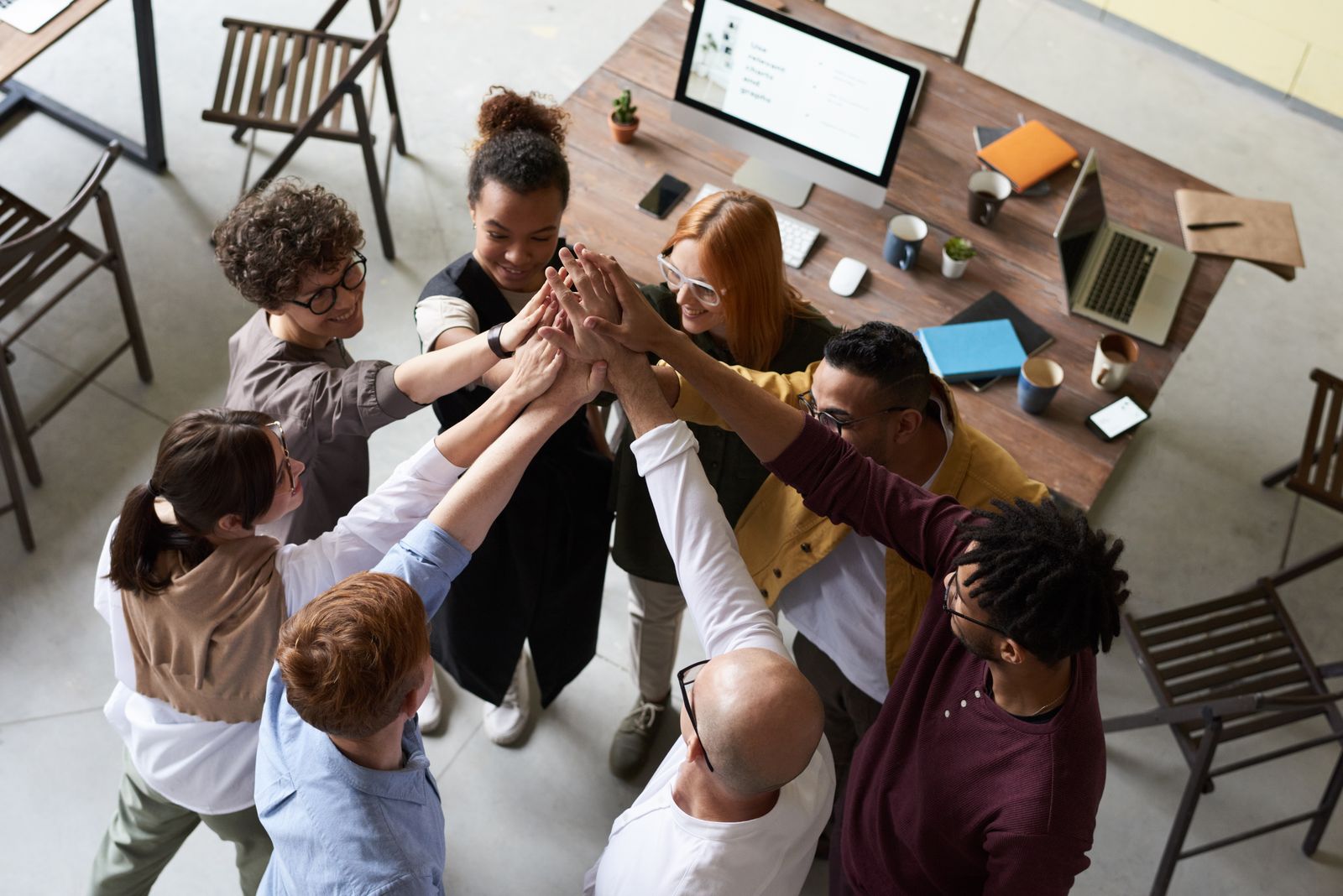 Group of colleagues posing as a team