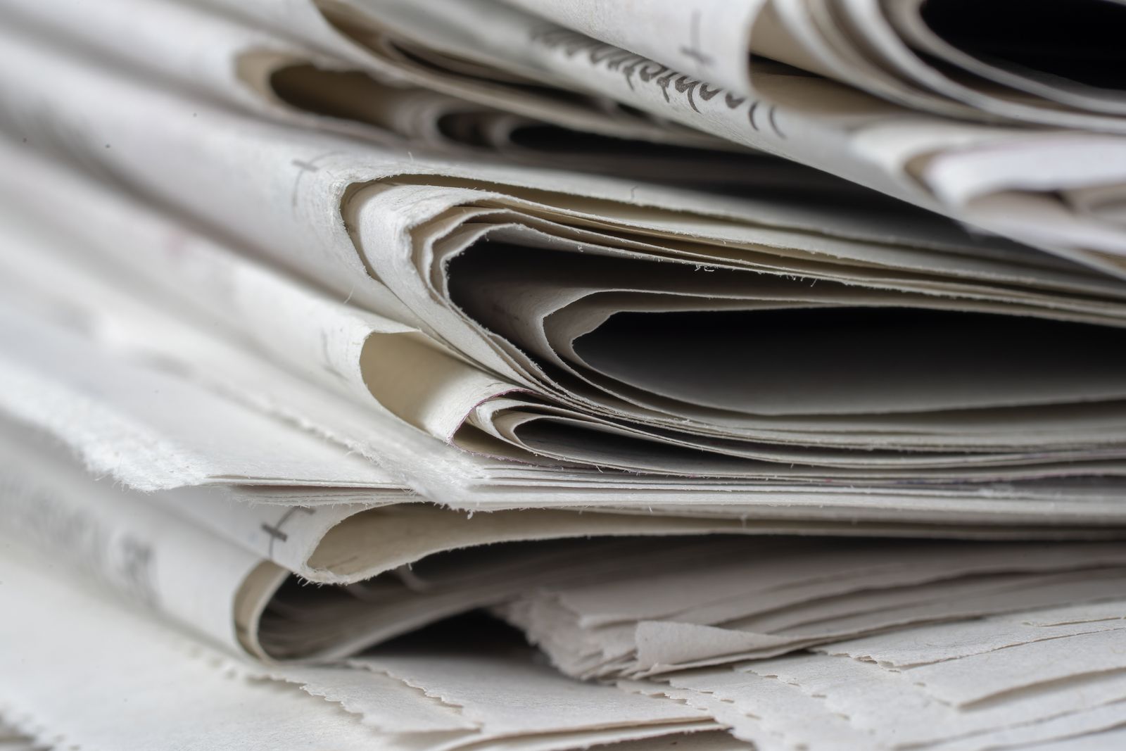 Newspapers stacked for delivery