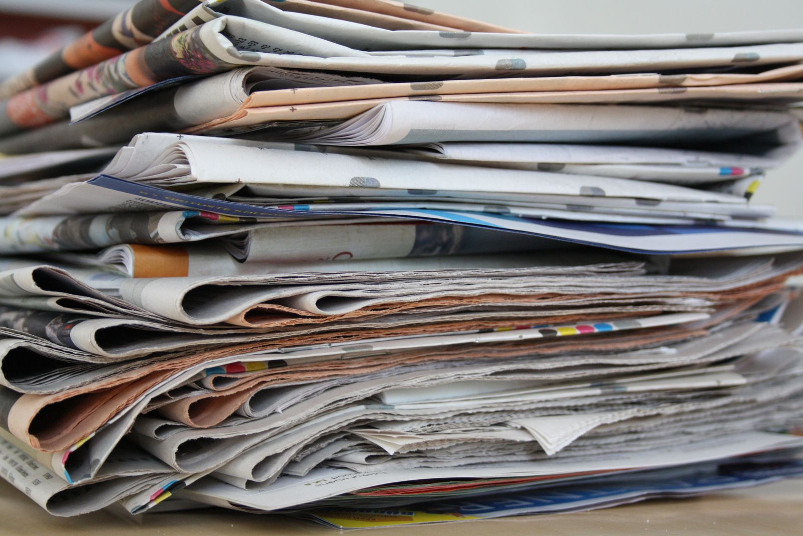 Close-up of newspaper front pages