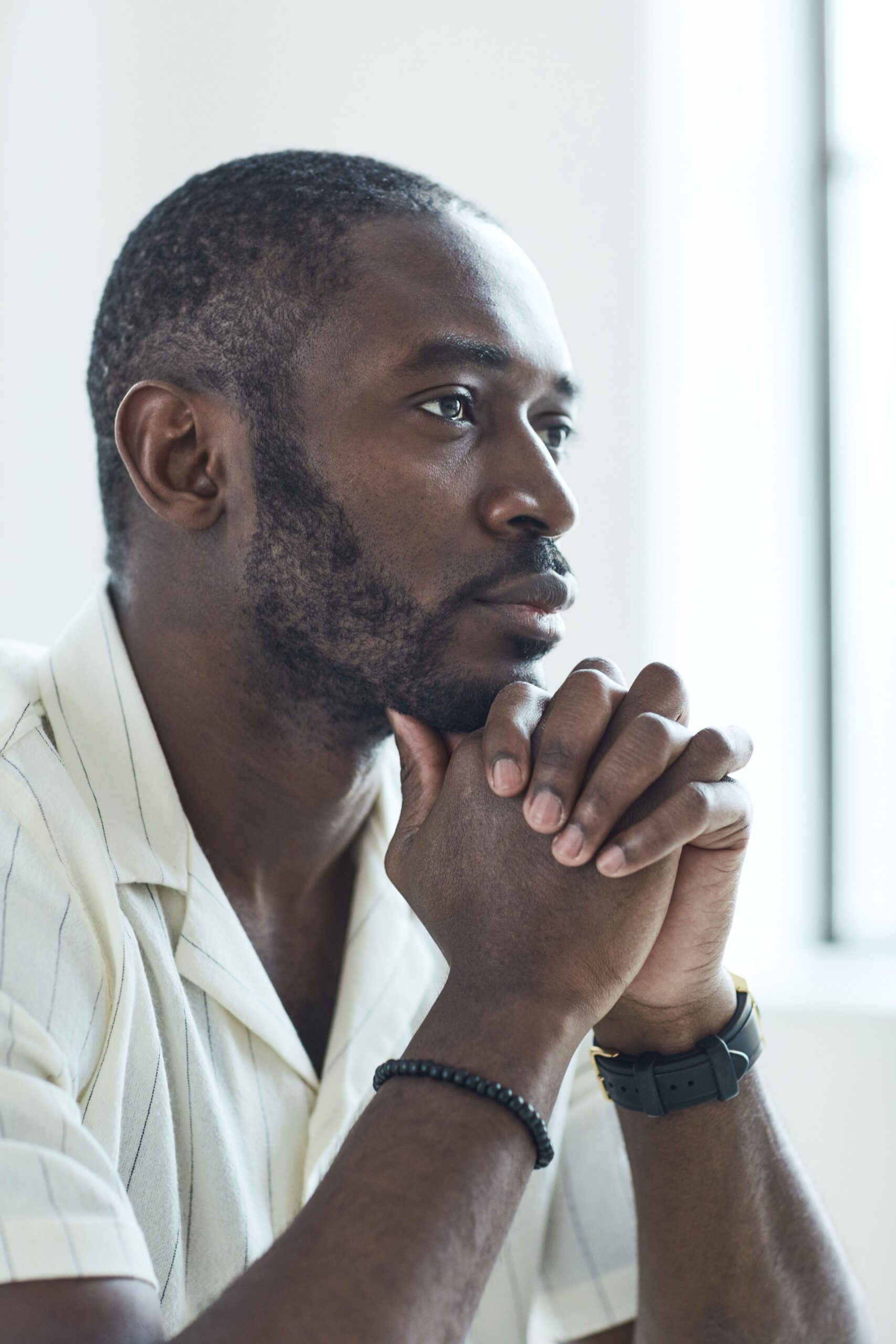 Side profile of a man deep in thought