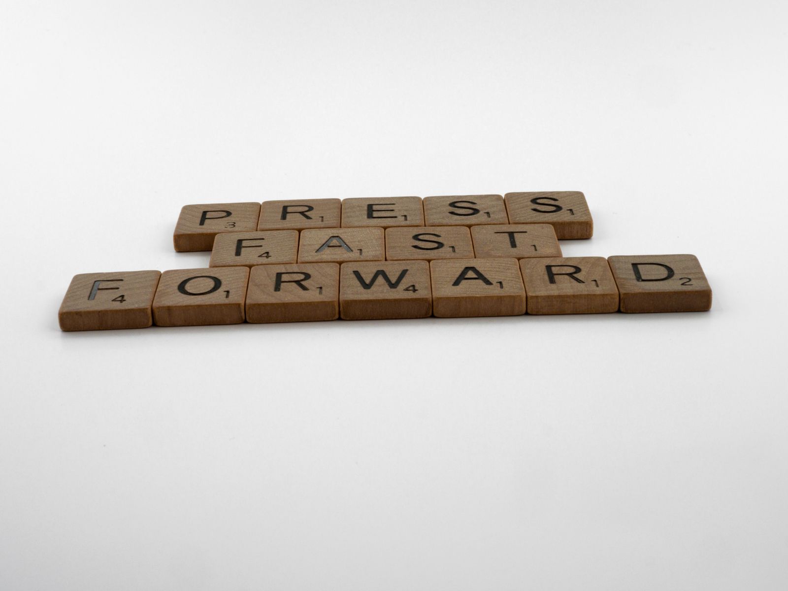 Wooden letter tiles on a table