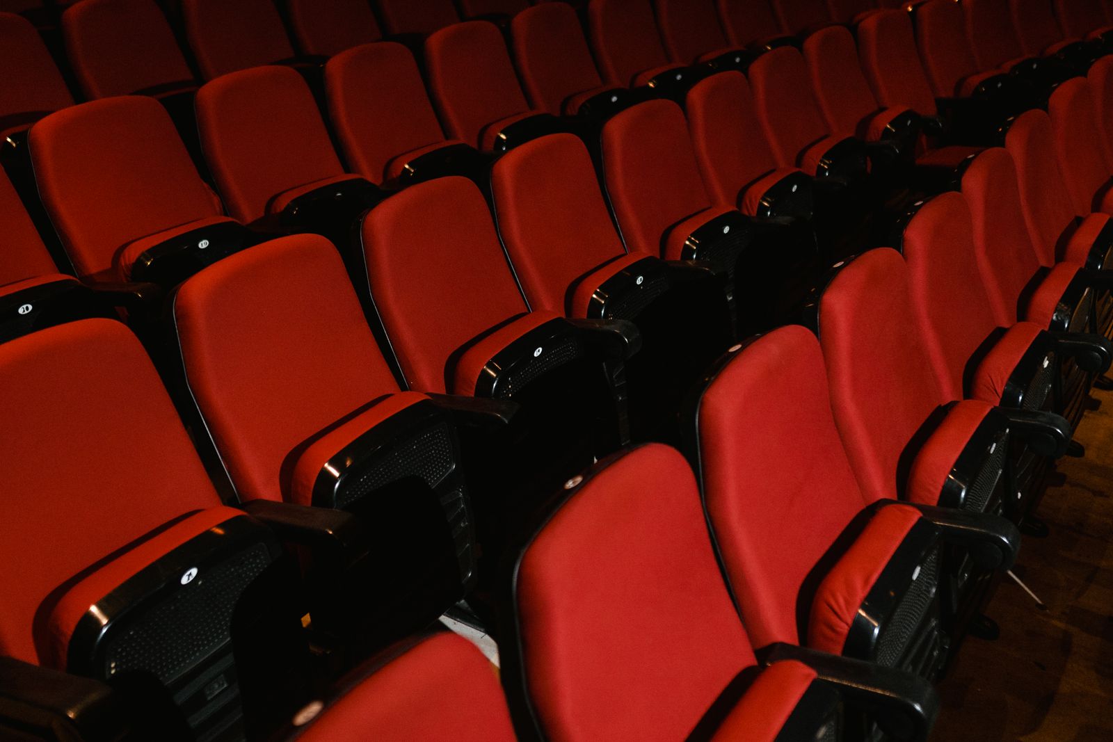 Red seats in a cinema theater — das Kino