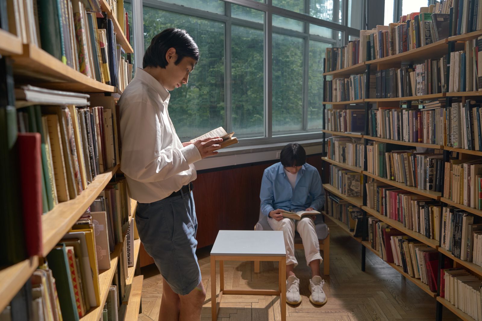 Students celebrating in a library