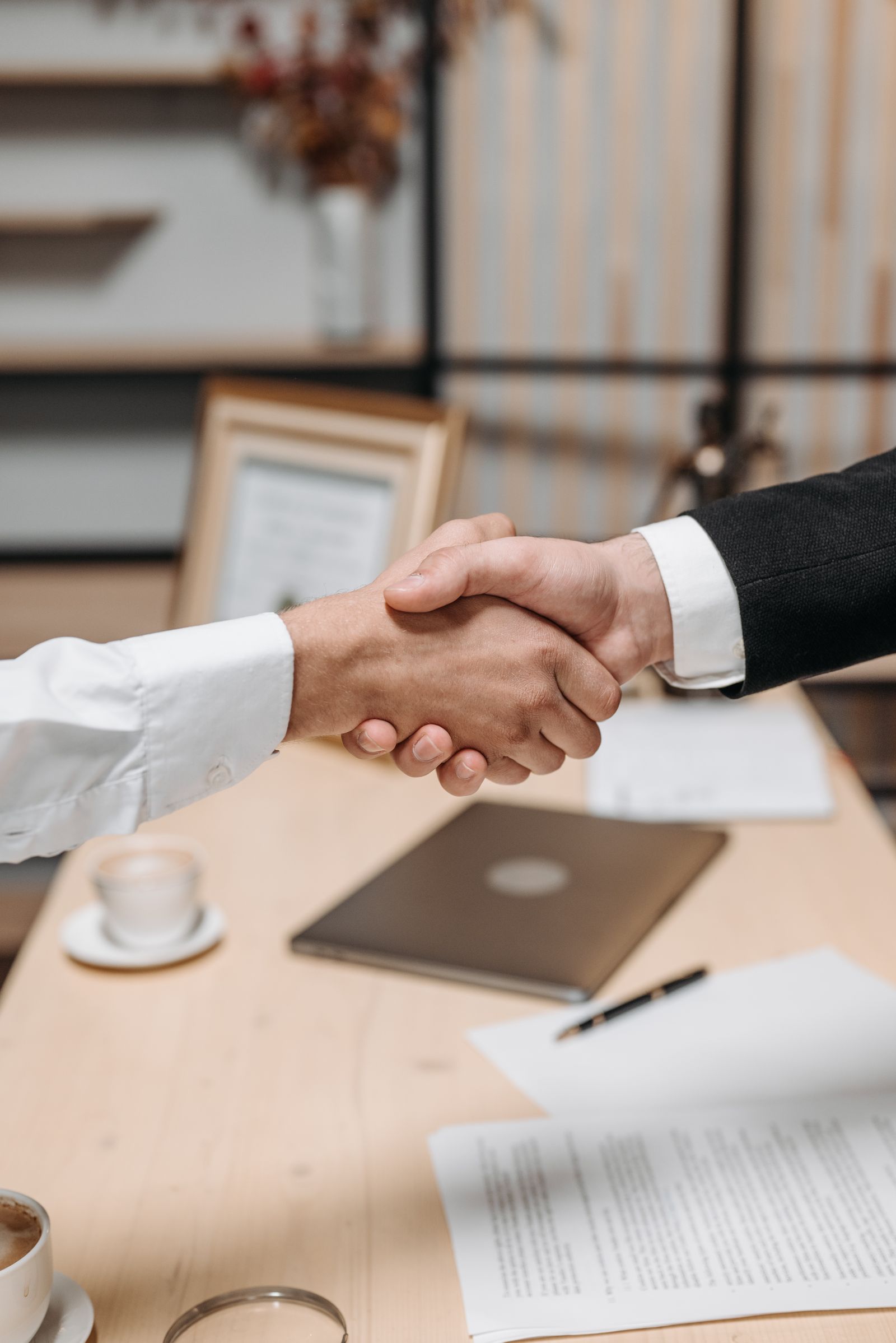 Handshake symbolizing agreement and partnership