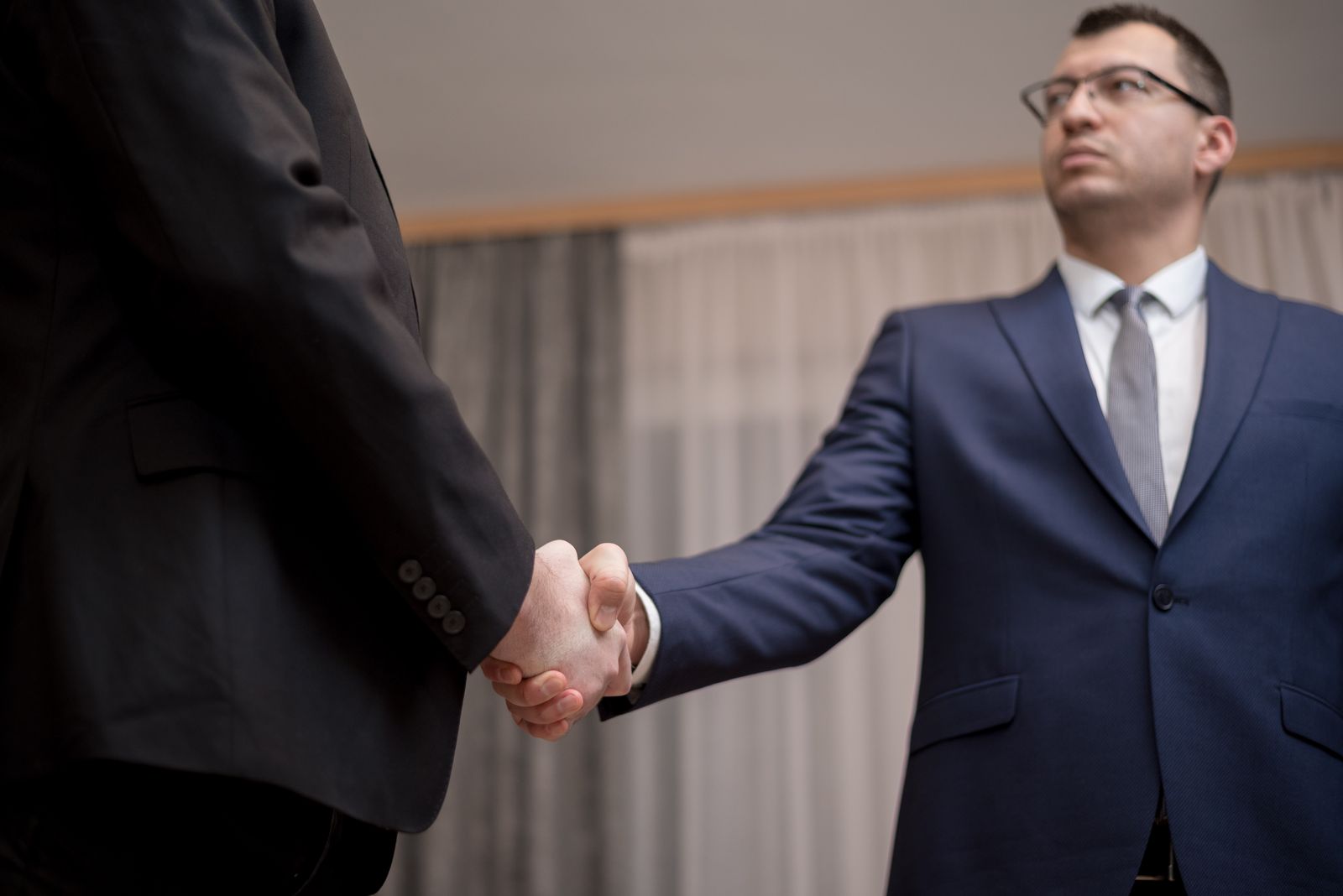 Business handshake between colleagues