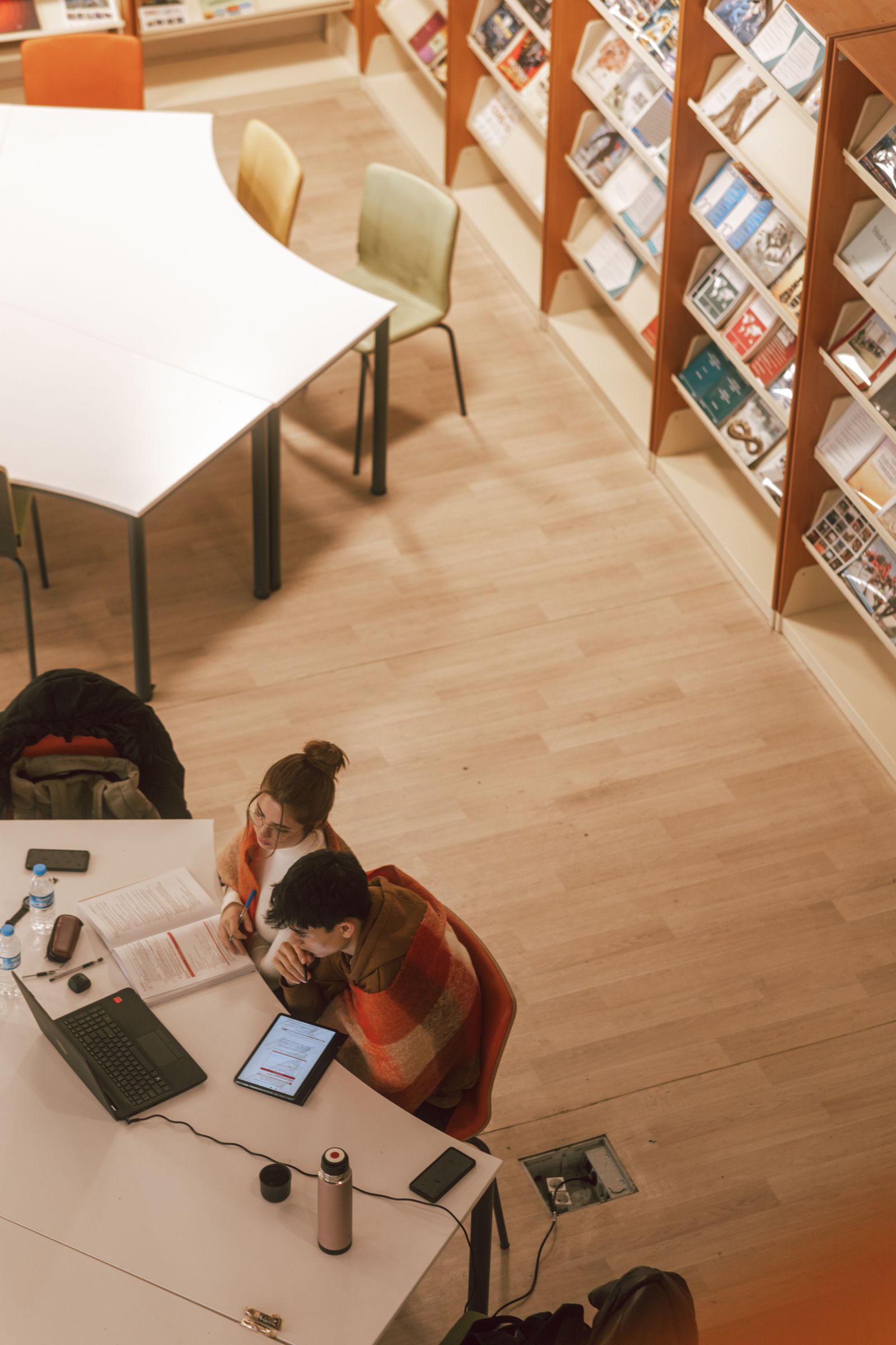 Couple studying together at a library
