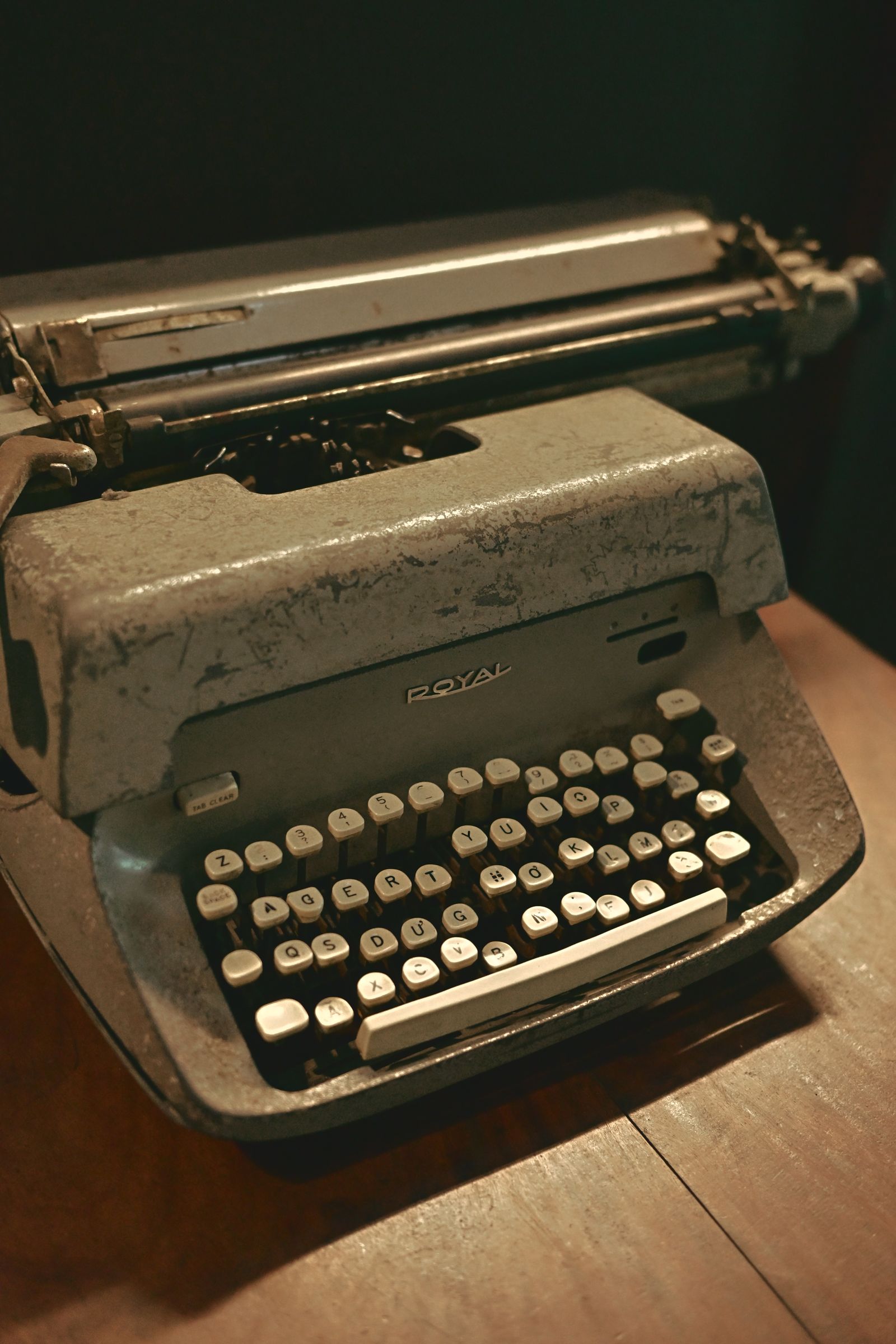 Vintage typewriter on a wooden desk