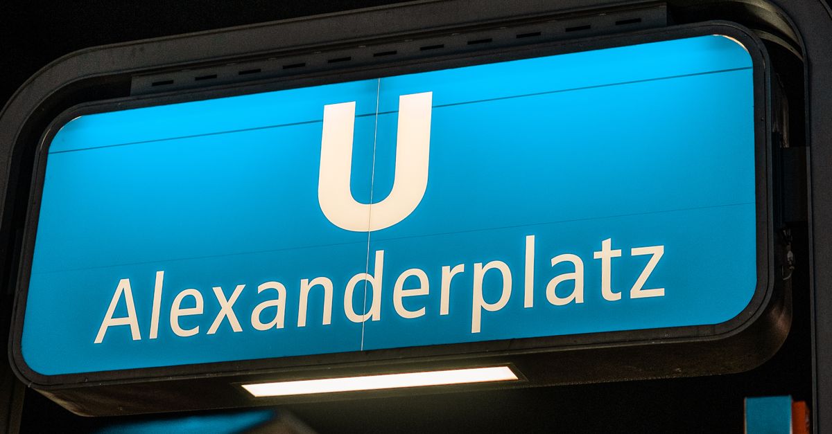 German subway sign at Alexanderplatz station in Berlin at night