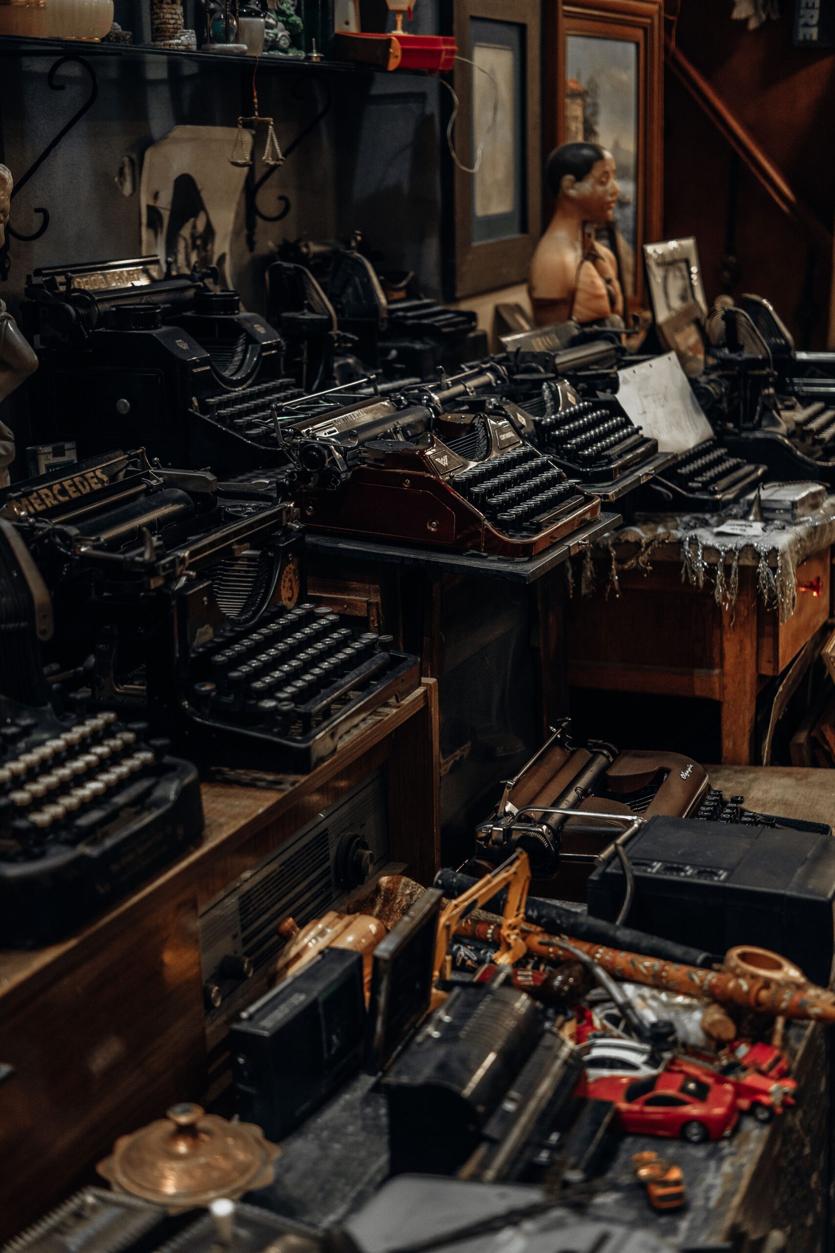 Explore a nostalgic setting with vintage typewriters and antique items.