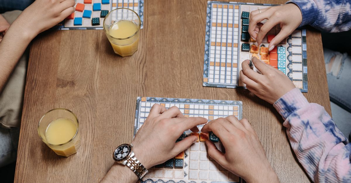 Friends enjoying a board game night together