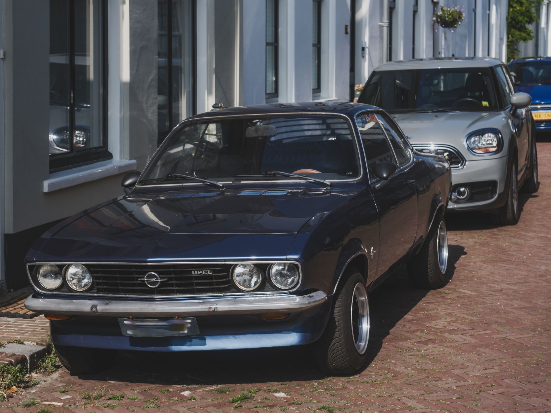 Vintage Opel Kadett parked on a sunny street