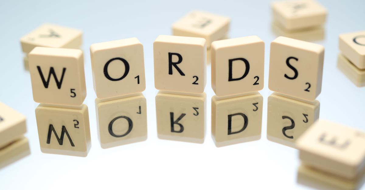 Wooden Scrabble letter blocks with words